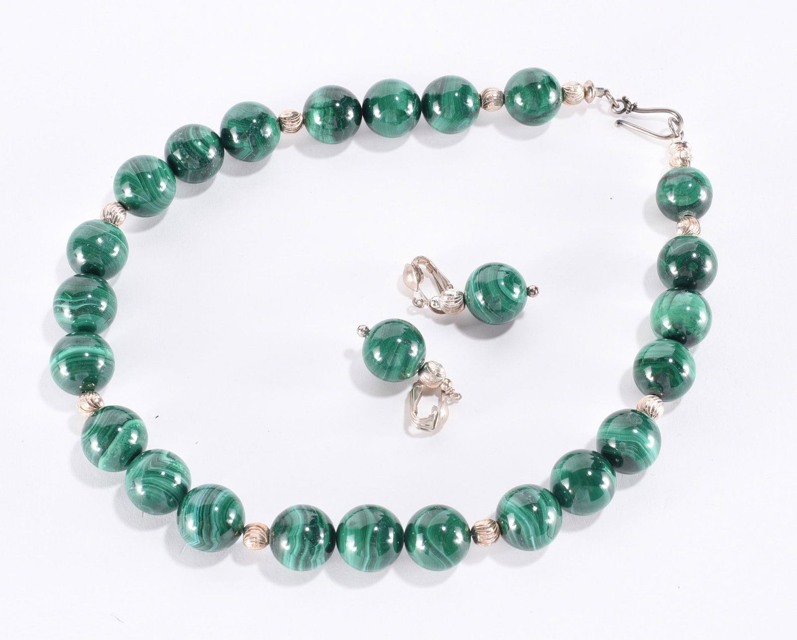 Malachite beaded necklace with silver tone spacers and Sterling Silver clip earrings. 16" (1 of 2)