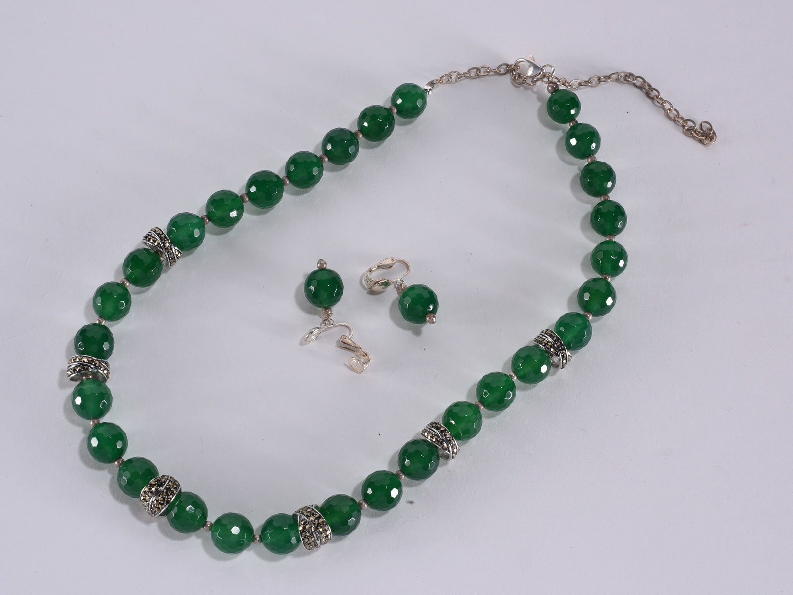 Faceted green agate beaded necklace with marcasite spacers and pearls. Sterling Silver clasp and: Faceted green agate beaded necklace with marcasite spacers and pearls. Sterling Silver clasp and clip earrings 18"