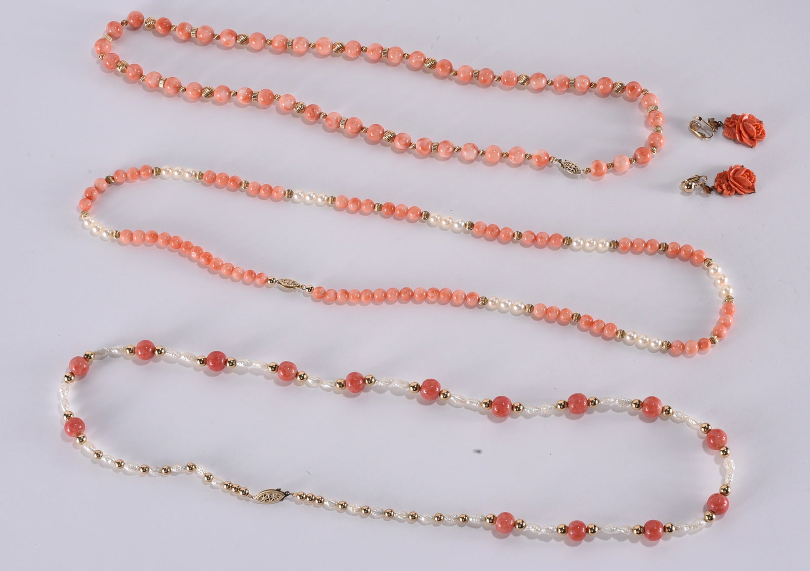 Pink coral bead necklace w/ gold tone spacers. Gold Fill clasp. 24"?plus; Coral rice pearl & gold (1 of 2)