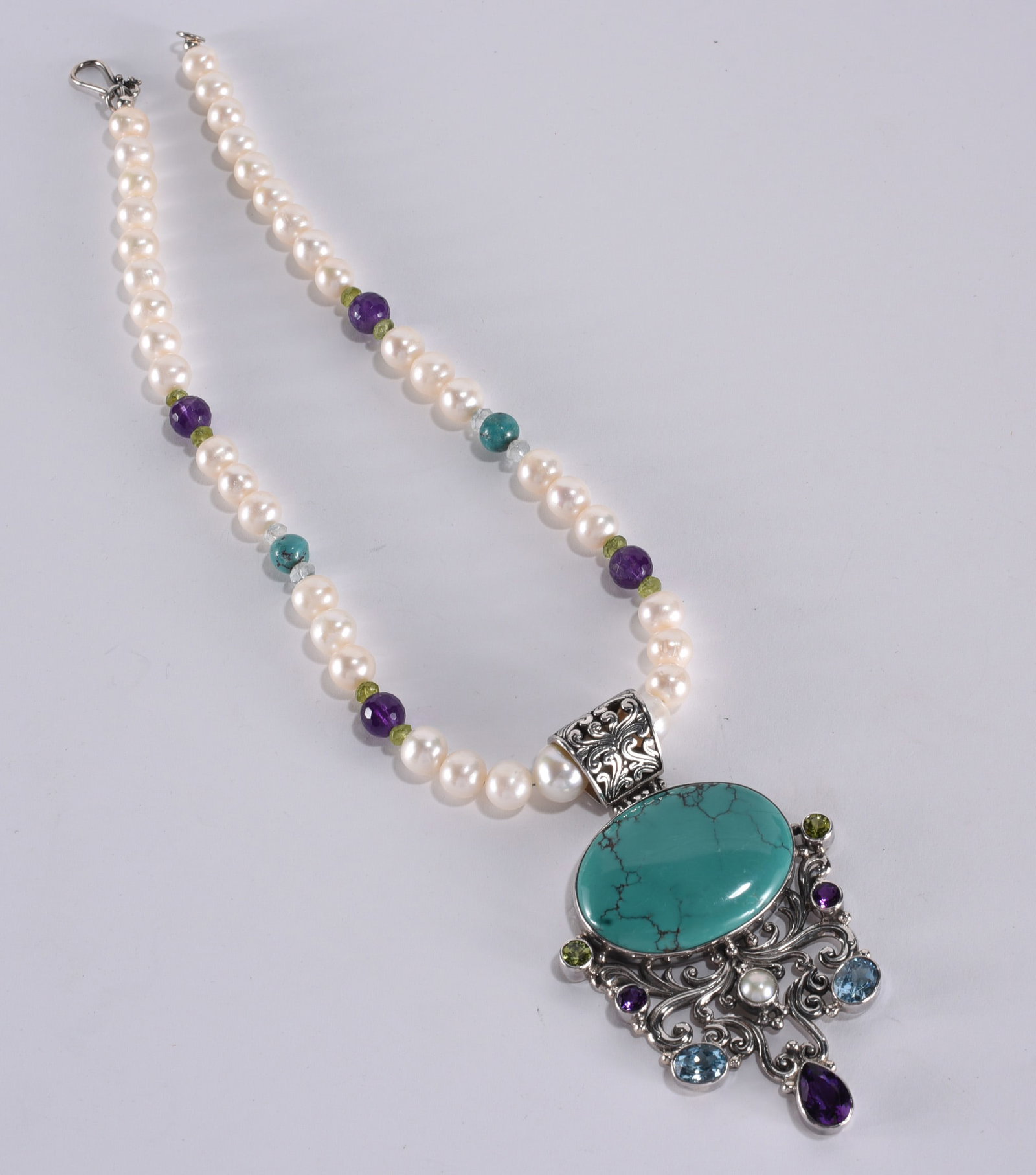 Artisan strung Sterling Silver turquoise and gemstone pendant on pearl and gemstone necklace. (1 of 3)