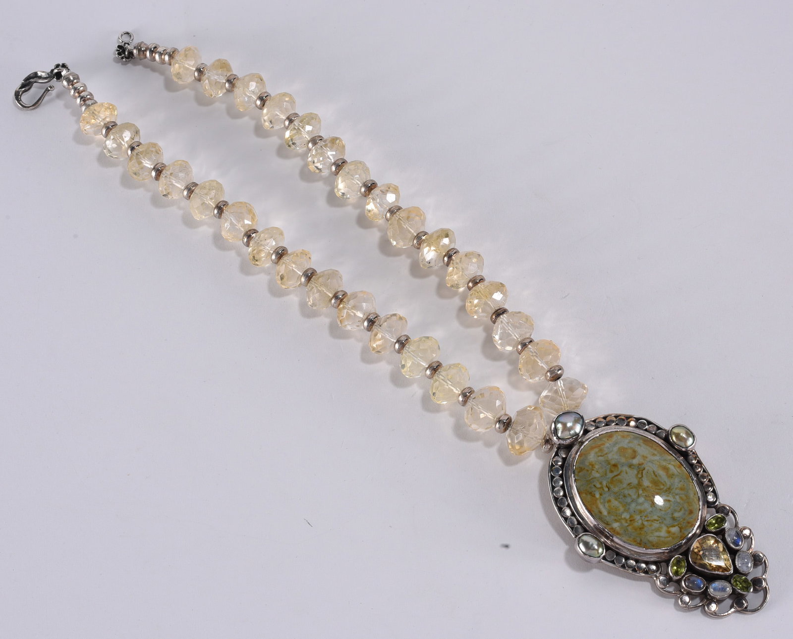 Artisan strung quartz necklace with Sterling Silver pendant pearls, citrine, peridot, moonstone. (1 of 3)