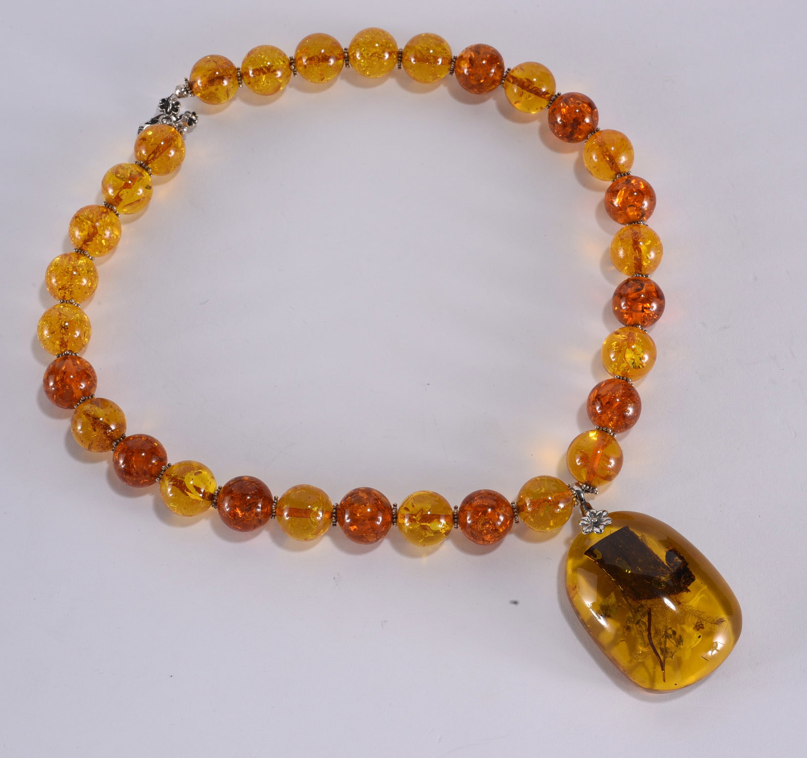 Formed amber pendant and bead necklace. Sterling Silver hook. 20" (1 of 2)