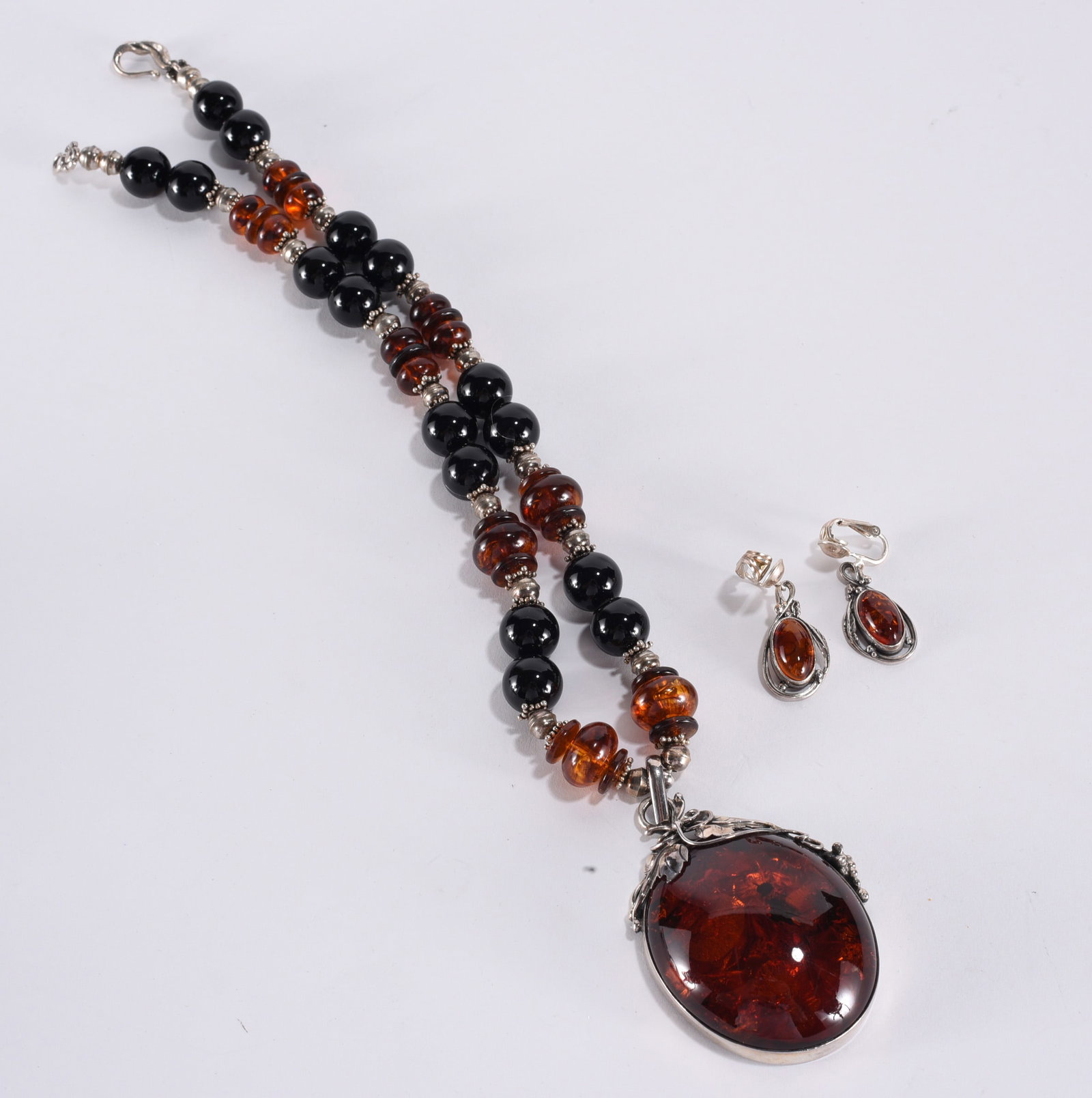 Sterling Silver floral amber pendant with various amber beads. Sterling Silver clasp. Sterling (1 of 3)