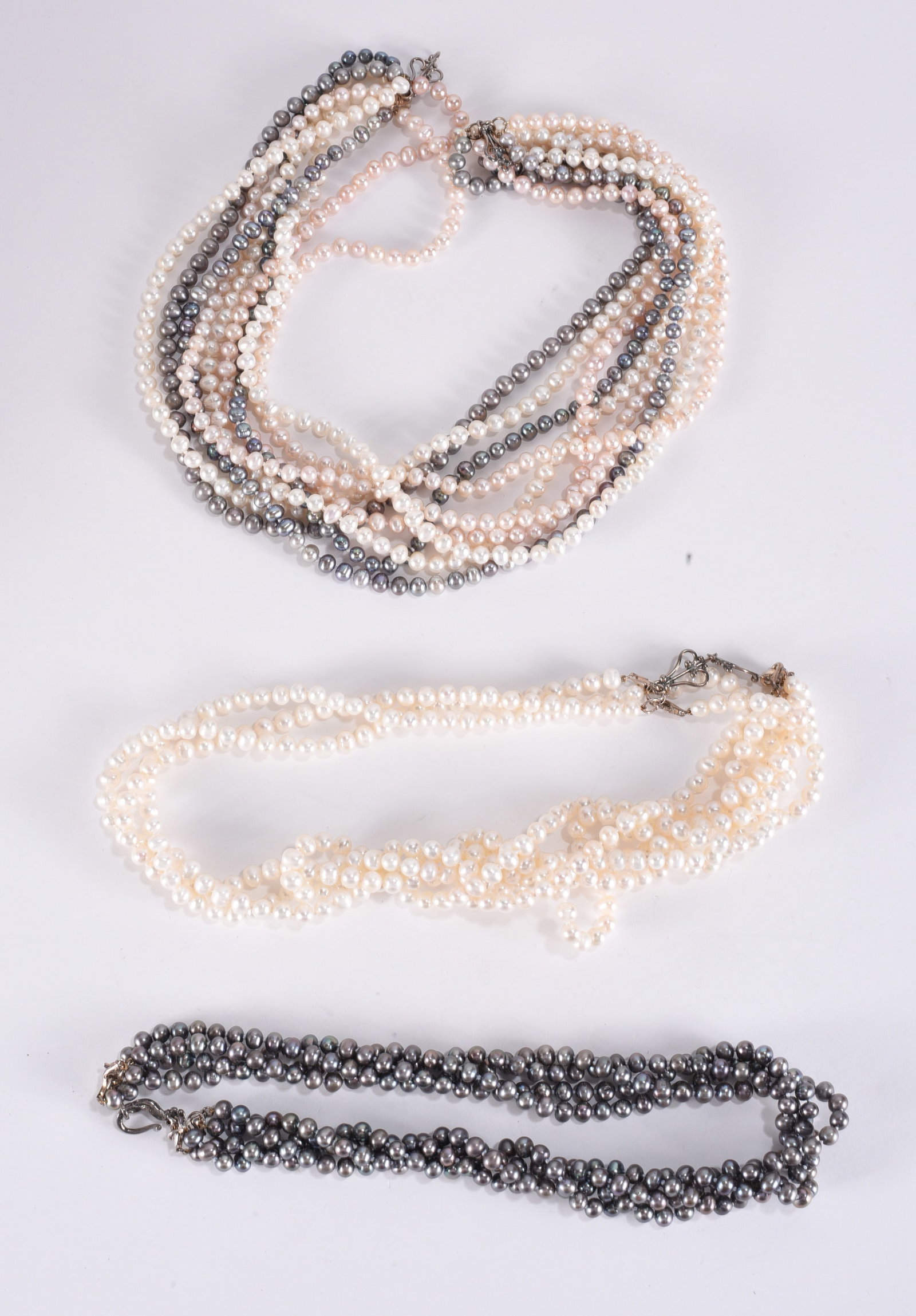 9 strand grey and white pearl torsade necklace. 17" ?plus; 5 strand faux white pearl necklace. (1 of 1)