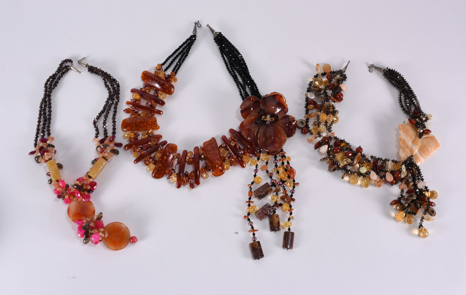 Magnificient multi stone necklace - various agate, amber, citrine & black beads. 5 strands tassles.: Magnificient multi stone necklace - various agate, amber, citrine & black beads. 5 strands tassles. 21"?.plus; Smokey quartz, camelian, agate, citrine, shell necklace with 4 tassels - butterfly agate,