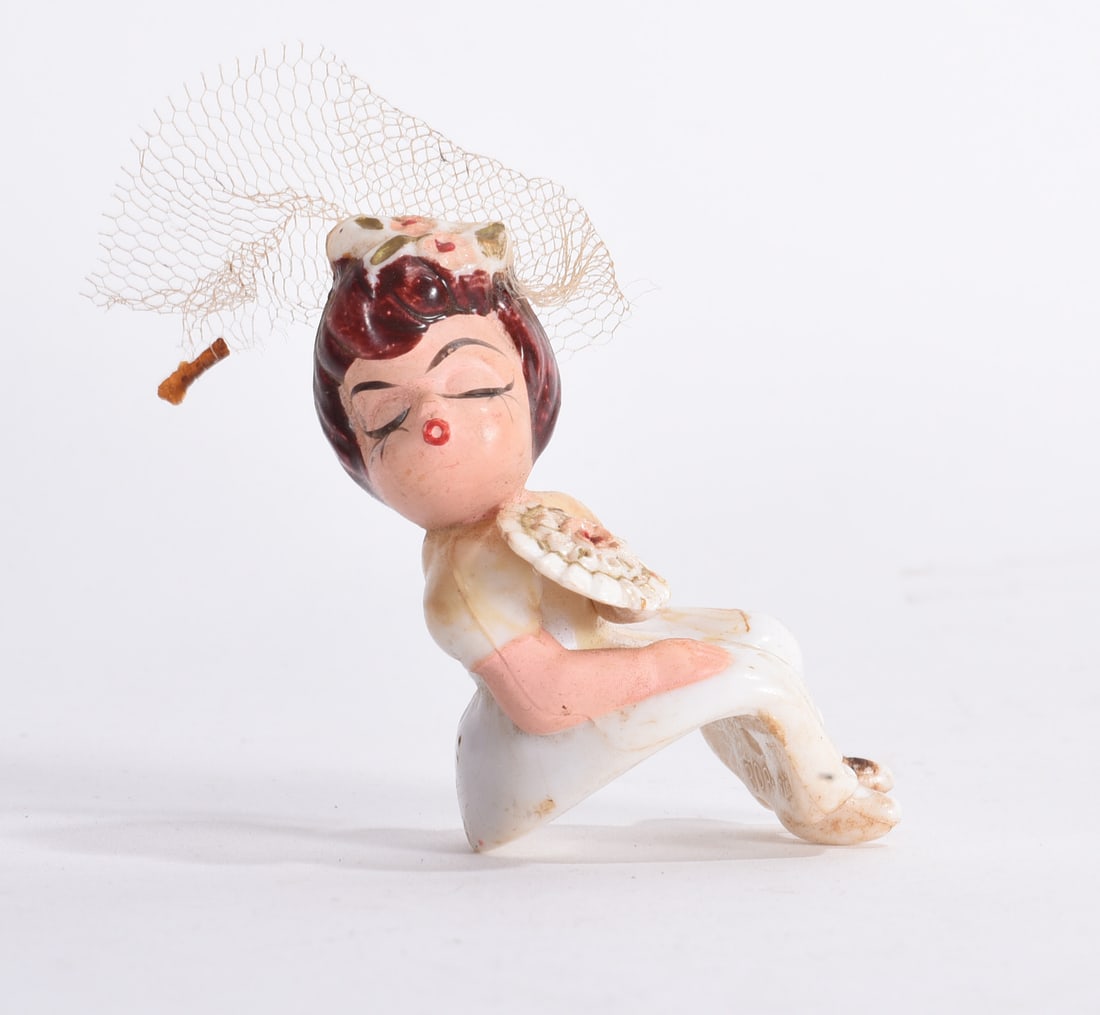 Vintage Lady Head Vase Figurine: Vintage lady head vase figurine with applied netting and floral decoration, modeled seated with closed eyes.