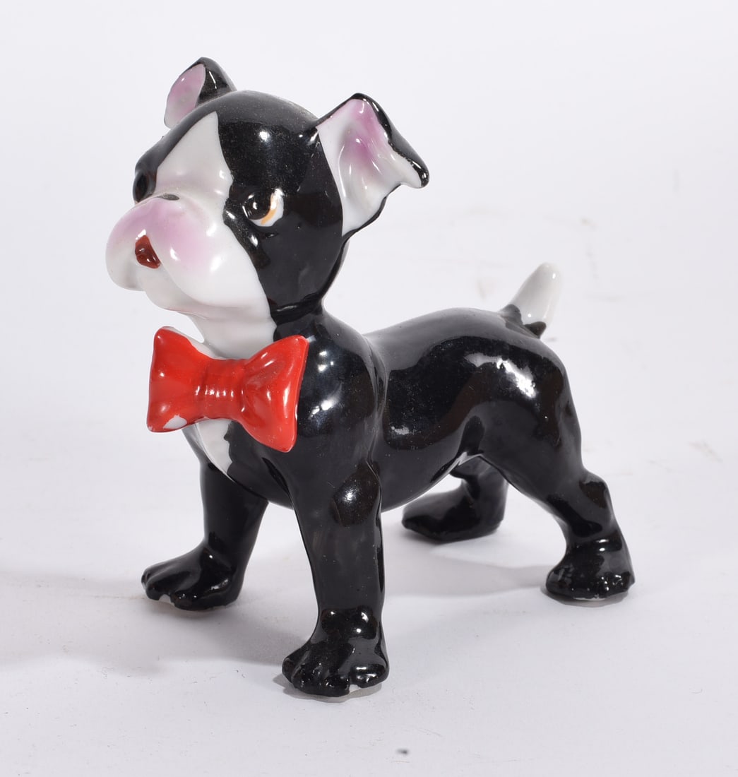 Boston Terrier Figurine: Glossy black and white ceramic Boston terrier figurine with oversized red bow tie.