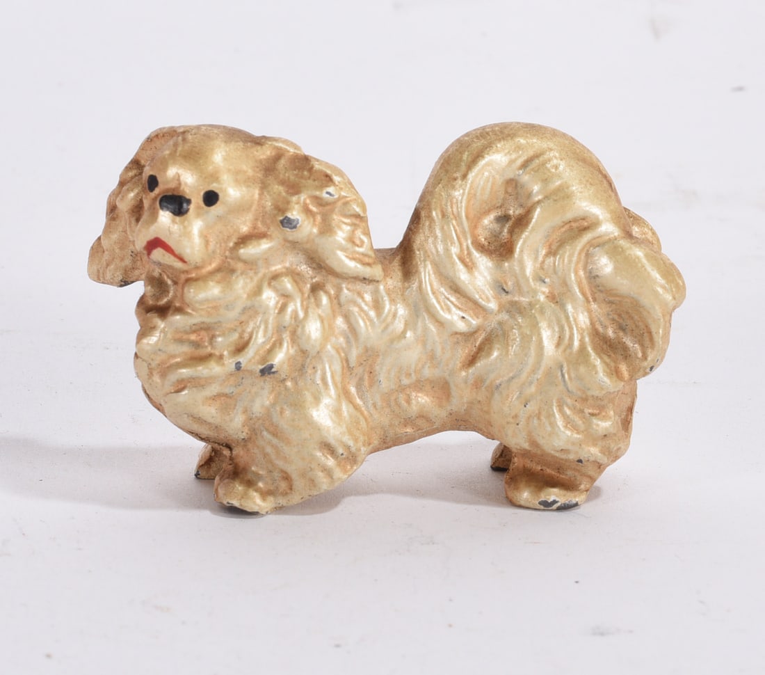 Gold Painted Pekingese Figurine: Pair of ceramic owl figurines perched on branch base with floral decoration and painted eyes.