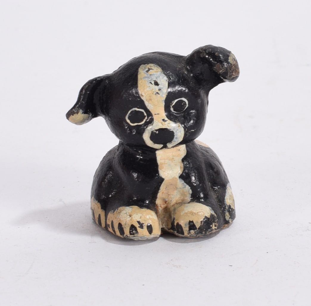 Black and White Puppy Figurine: Small black and cream puppy figurine with folk art styling and crackled painted finish.