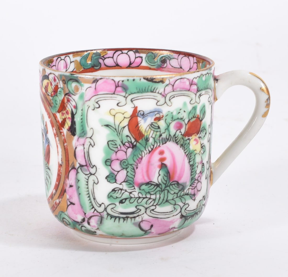 Famille Rose Style Porcelain Cup: Chinese famille rose style porcelain cup with polychrome floral and fruit decoration.