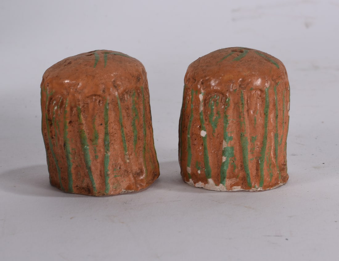 Redware Pottery Salt and Pepper Shakers: Pair of hand-painted redware pottery salt and pepper shakers with green drip decoration.
