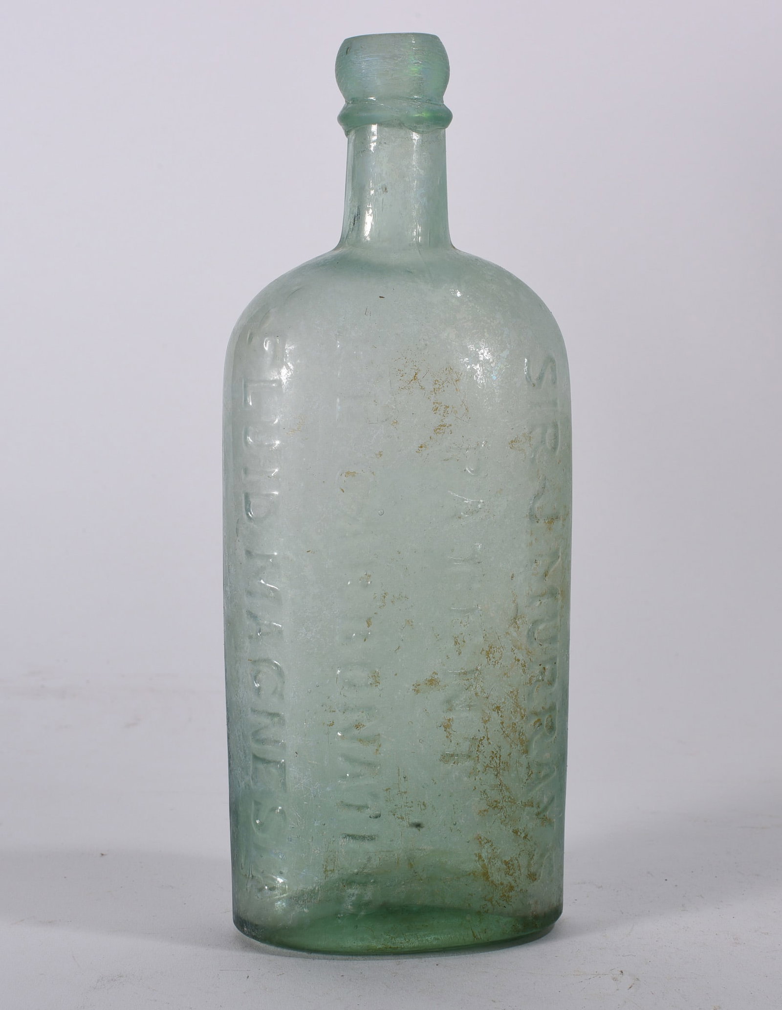 Antique Bottles: Early aqua cylindrical utility or medicine bottle with narrow neck and tooled lip. Surface staining and light iridescence from burial.
