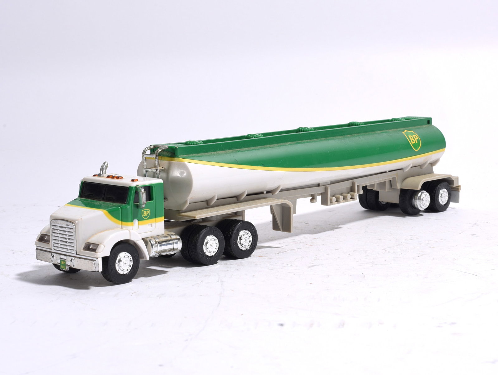Hess Gasoline Sport Utility Vehicle: Hess Gasoline Sport Utility Vehicle finished in cream and green with chrome-style trim, roof rack details, and rolling wheels. Light wear from handling and display.
