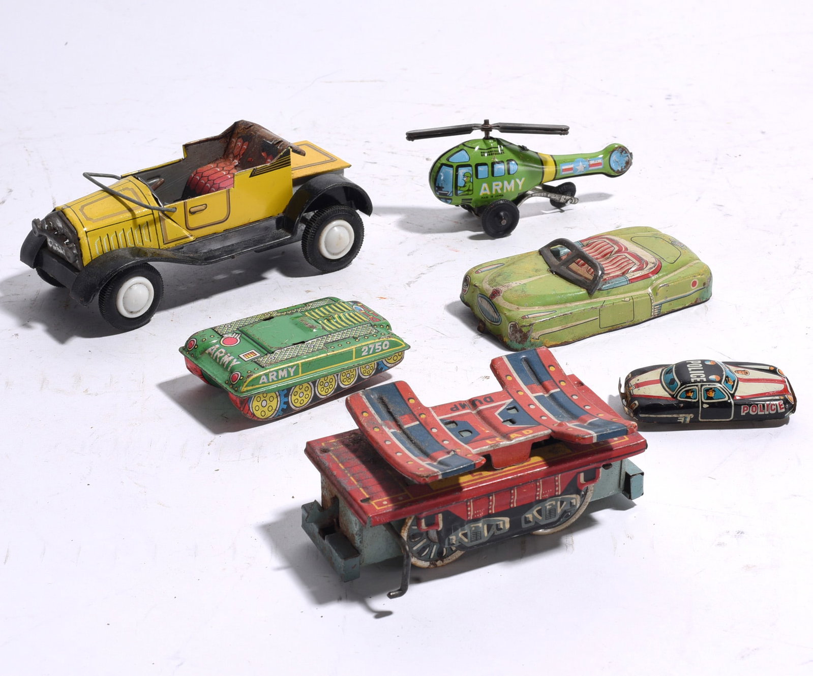Group of Five Assorted Vintage Vehicle Bodies and Castings: Collection of five assorted toy vehicle bodies and castings including station wagon, sedan, coupe, and body shell examples. Various conditions with wear, oxidation, and missing components.