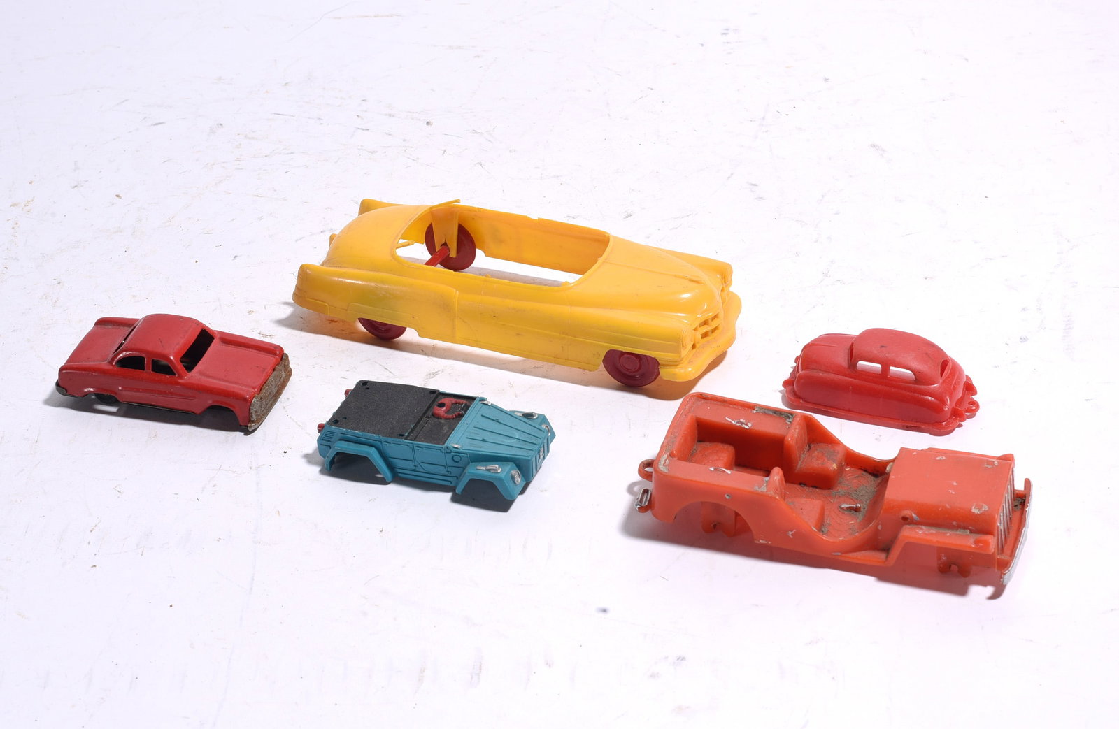 Group of Five Assorted Plastic Toy Vehicles and Bodies (1 of 1)