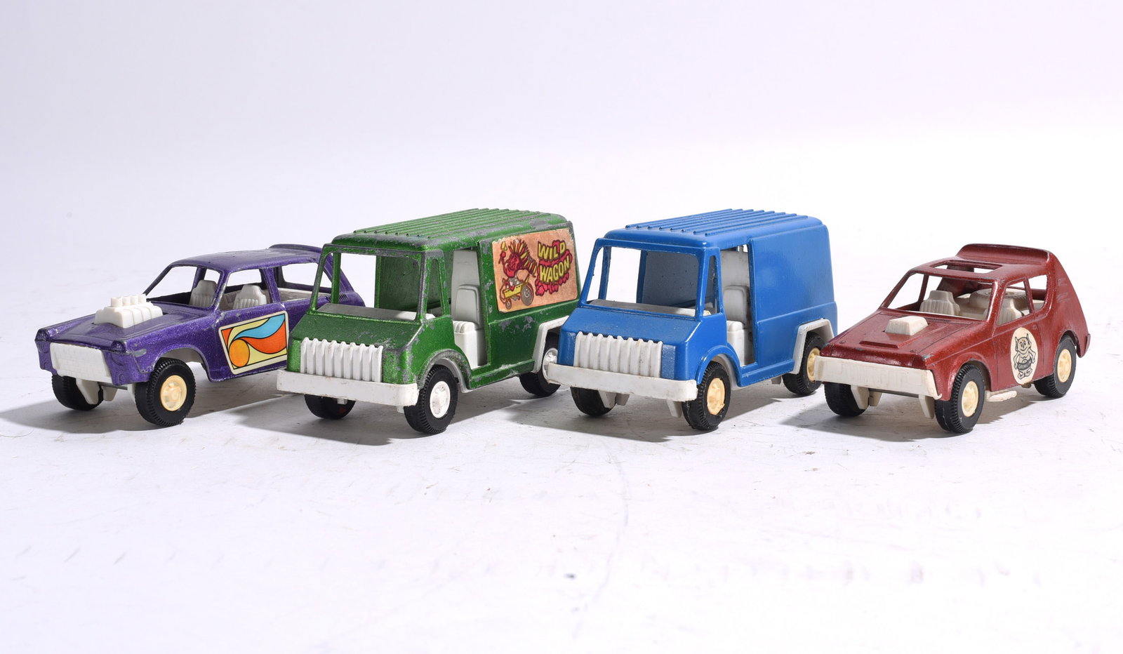 Group of Four Plastic Utility and Delivery Vehicles (1 of 2)