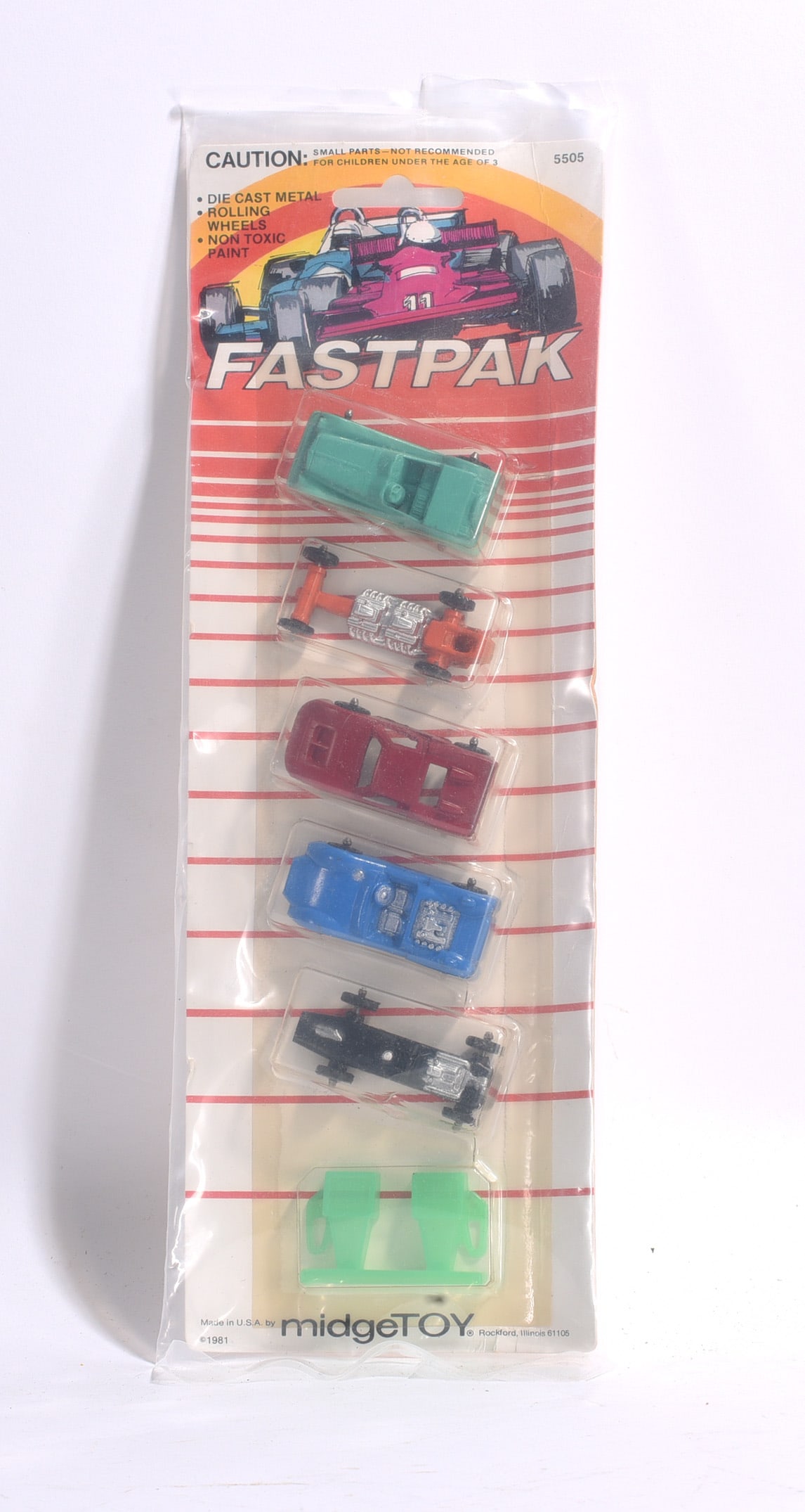 Midgetoy Fastpak Die-Cast Vehicle Set in Package: Vintage Midgetoy Fastpak die-cast vehicle set, carded and unopened. Includes assorted miniature vehicles and accessories on original 1981 packaging.