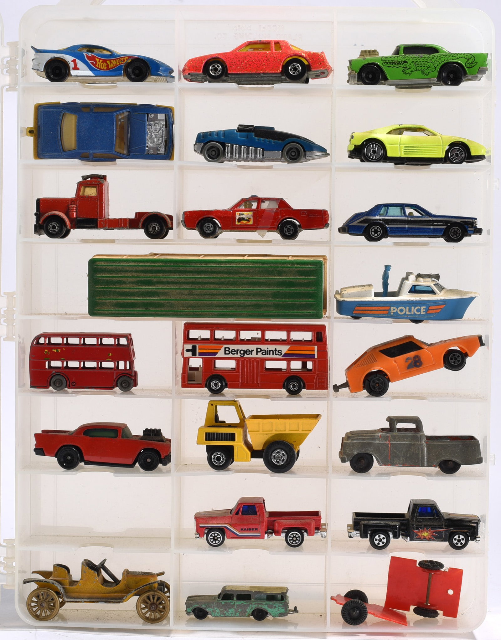 Mixed Matchbox, Corgi, and Promotional Die Cast Vehicle Collection in Display Case: Group of 40 pluss die cast and plastic toy vehicles housed in a compartment storage case. Includes examples by Matchbox, Corgi Juniors, Husky, and promotional issues featuring Land Rover SUVs, militar