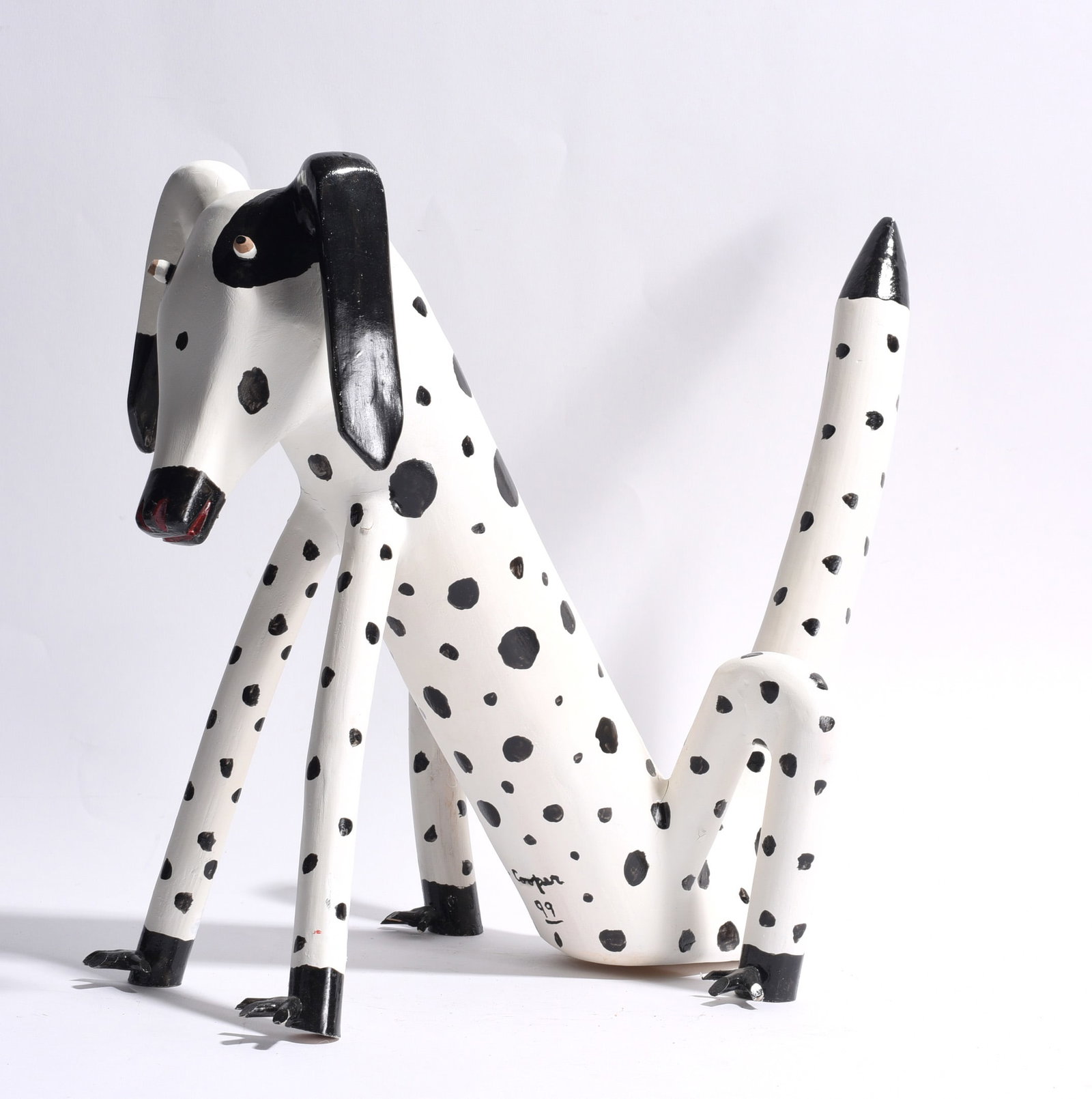 Calvin Cooper Folk Art Wooden Carved Dog: outstanding wooden carved dog. Signed on body, dated 1999. 13" x 15"