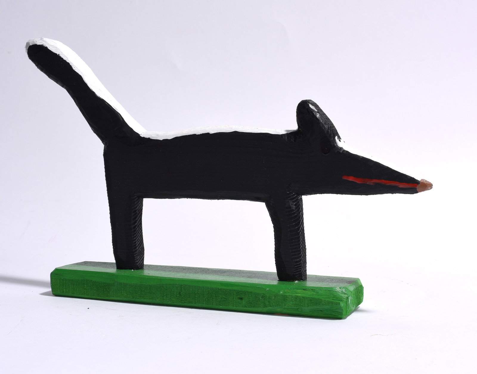 Minnie Adkins Carved Wooden Figure: carved wood and paint. Signed on bottom dated 2020. 11" x 8"