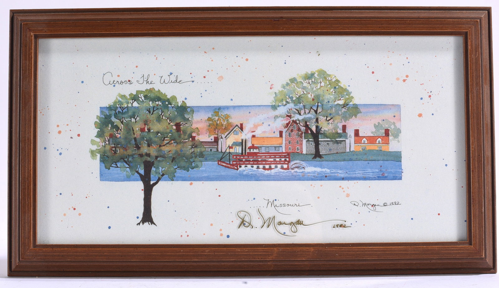 D. Margie "Across the Wide Missouri" Signed Folk Art , 1992: 16"x8" Signed and dated folk watercolor titled "Across the Wide Missouri" depicting a riverside village with whimsical watercolor splatter accents.