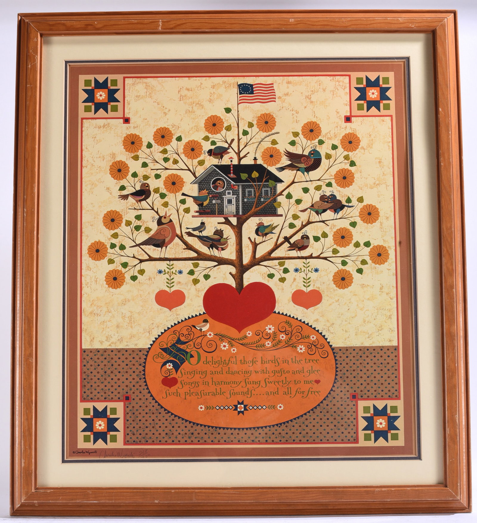 Charles Wysocki Pencil Signed Framed folk art print: 22.5"x25 Framed folk art print depicting a whimsical bird-filled tree with hearts, flowers, a birdhouse, and patriotic motifs. Signed in pencil below the image.