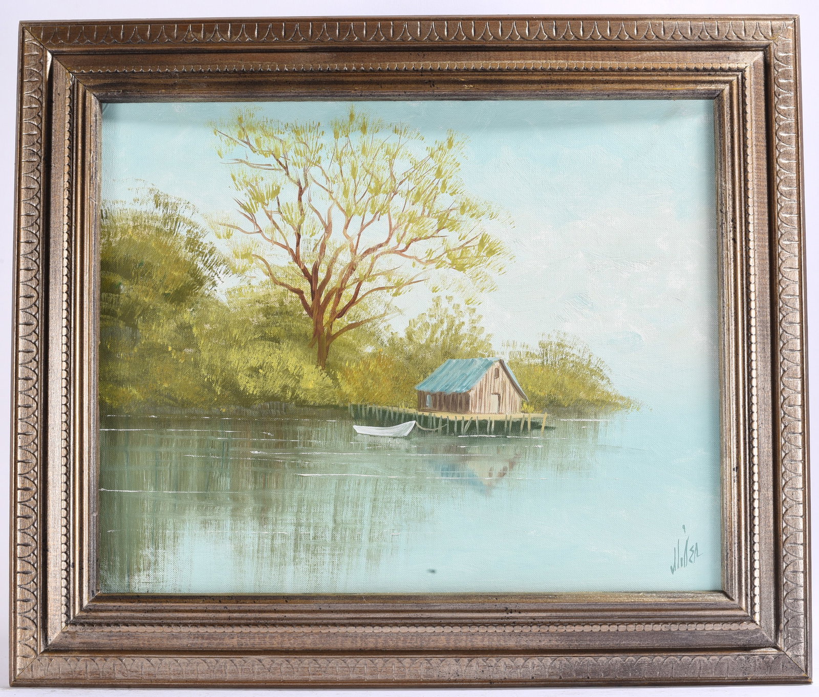Lakeside Cabin Landscape Painting Signed: 22"x25" Original landscape painting depicting a small cabin and rowboat along a peaceful lakeshore beneath a large shade tree. Signed lower right.