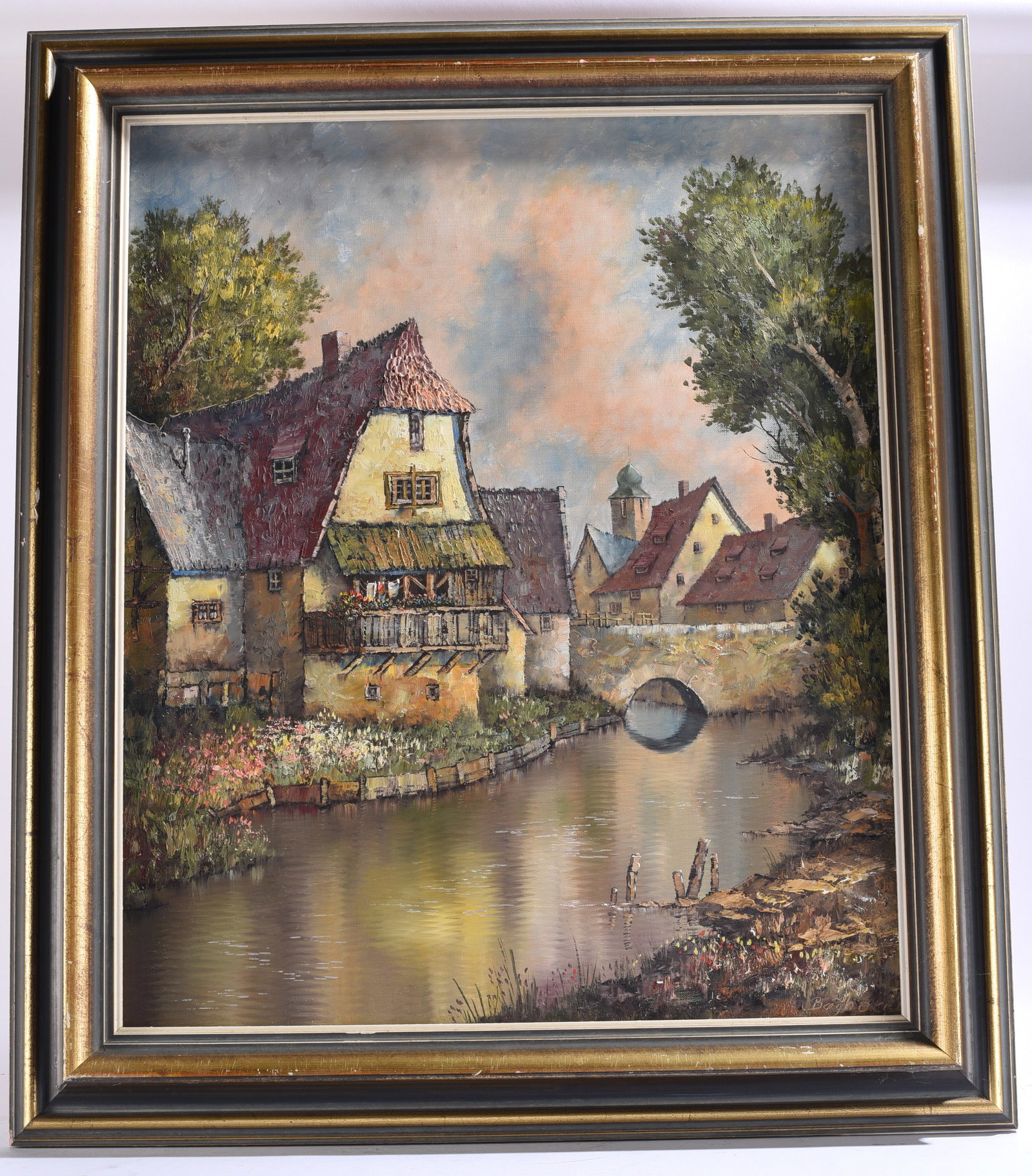 European Village Canal Oil Painting Signed: 25"x28" Original oil painting depicting a European canal village with stone bridge, historic homes, and colorful gardens. Signed lower right.