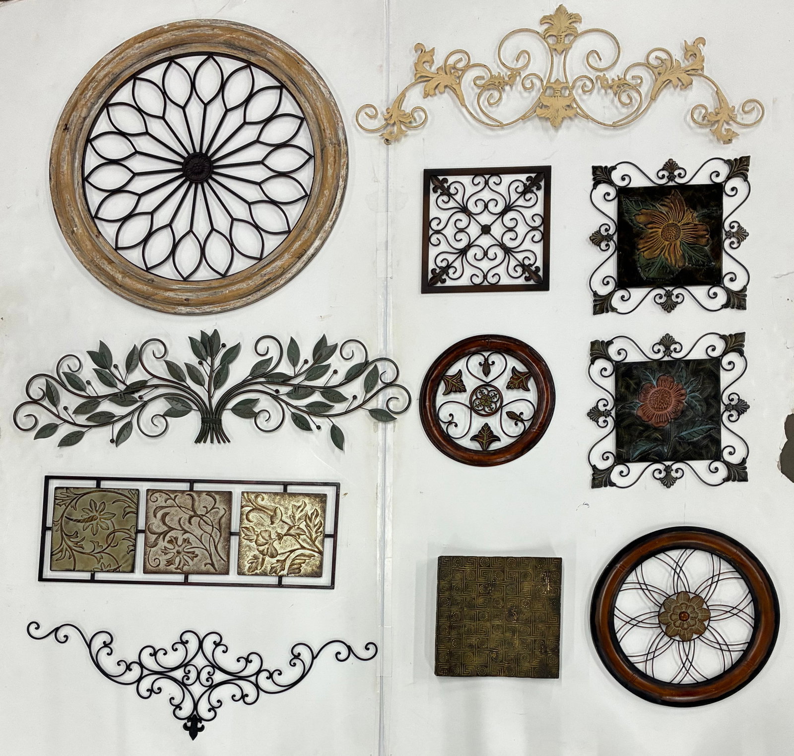 Decorative Metal Wall Art & Framed Accent Group: Largest 22" Group of decorative wall accents including framed metal medallions, floral plaques, leaf scrollwork, embossed panels, and ornamental ironwork in assorted finishes.