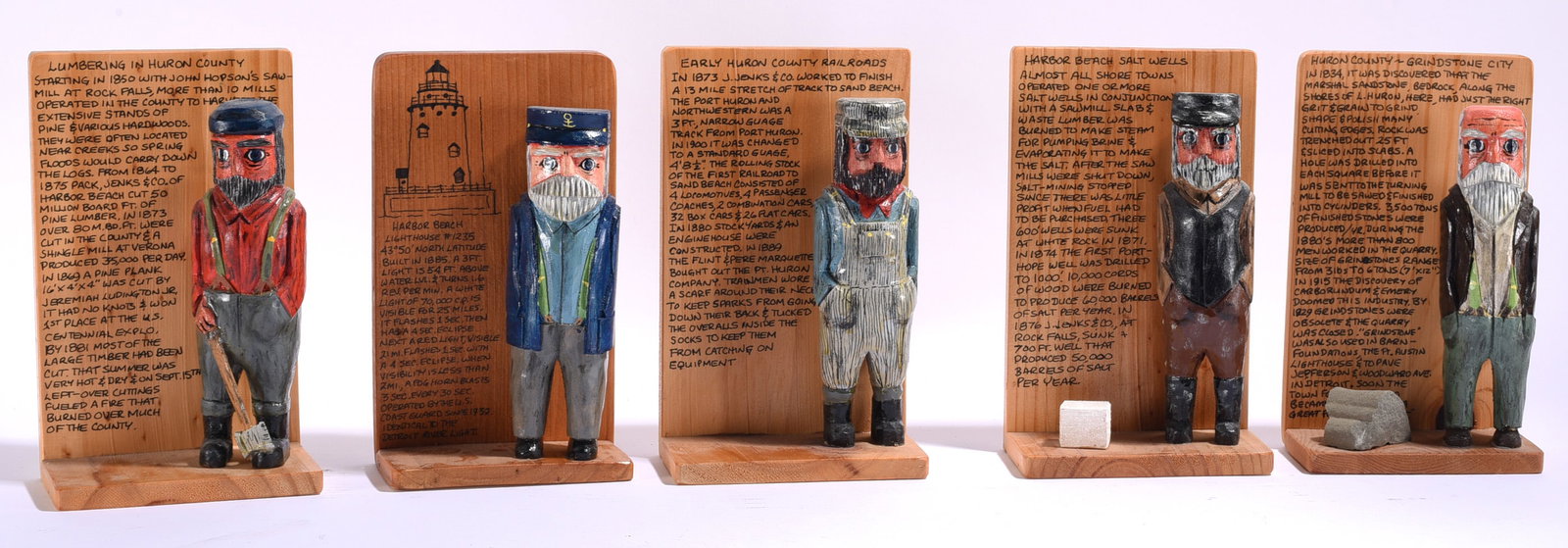 Hugh clark Folk Art Carvings: Each 5"x9" Hugh Clark is a folk carver known for detailed narrative wood carvings incorporating regional history and everyday subjects. This group consists of five carved and painted figural displays 