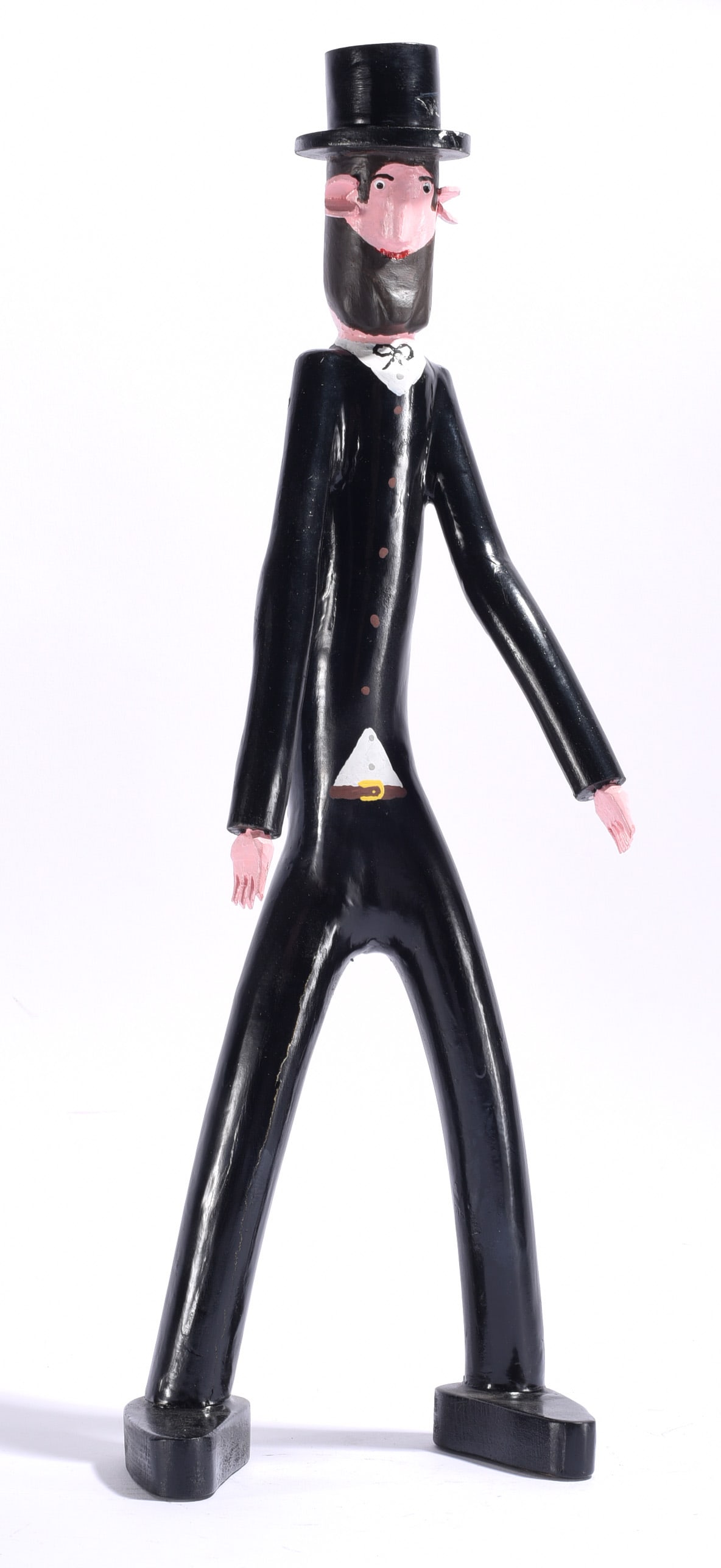Calvin cooper Carved Folk Art Abraham Lincoln: 23" Calvin Cooper (1921-2011) carved and painted folk art figure of Abraham Lincoln, depicted in his recognizable black suit, stovepipe hat and beard. Kentucky artist Cooper began serious woodworking 