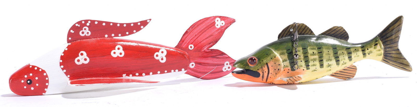 Ron Jackson Carved Fish Decoy and other: Largest is 6"x2" Group of carved and painted fish decoys by Ron Jackson, including a whimsical red fish form with white dotted decoration and a realistically inspired green fish with glass eye, painte