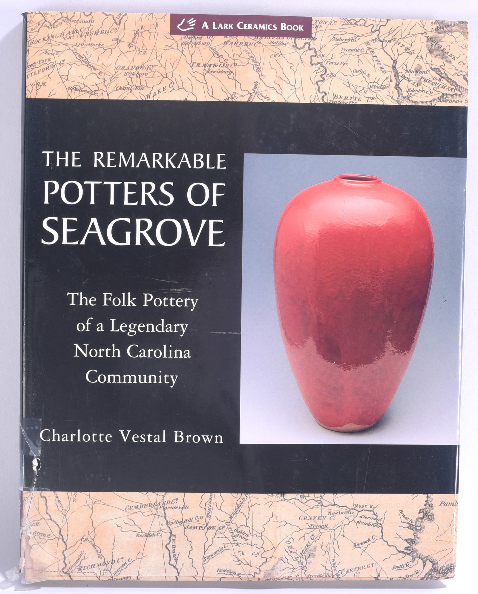 The Remarkable Potters of Seagrove Pottery Reference Book: 9"x12" "The Remarkable Potters of Seagrove: The Folk Pottery of a Legendary North Carolina Community" by Charlotte Vestal Brown. Illustrated reference book covering the potters and pottery traditions