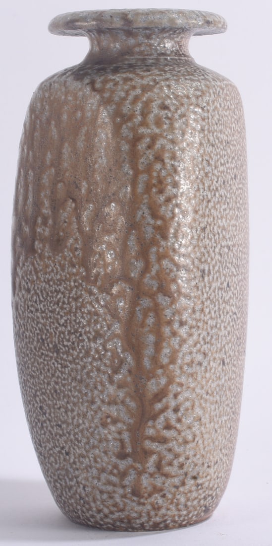 Donna Craven Salt Glaze Pottery Vase: 8" Donna Craven salt-glazed pottery vase with tall cylindrical form, flared rim and heavily textured surface. Mottled gray, cream and brown salt glaze with vertical glaze runs.