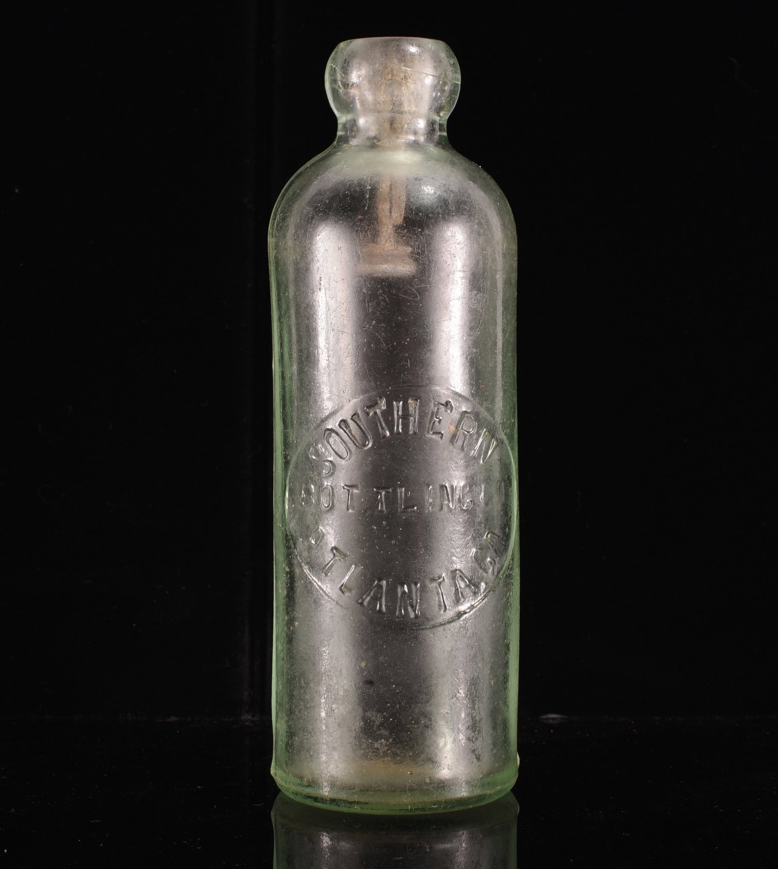 Southern Bottling Co. Atlanta GA Hutchinson Soda Bottle: 7" Antique light aqua glass Hutchinson soda bottle embossed "Southern / Bottling Co. / Atlanta, Ga." within an oval panel. Classic late-19th to early-20th-century Hutchinson form with blob top and hea