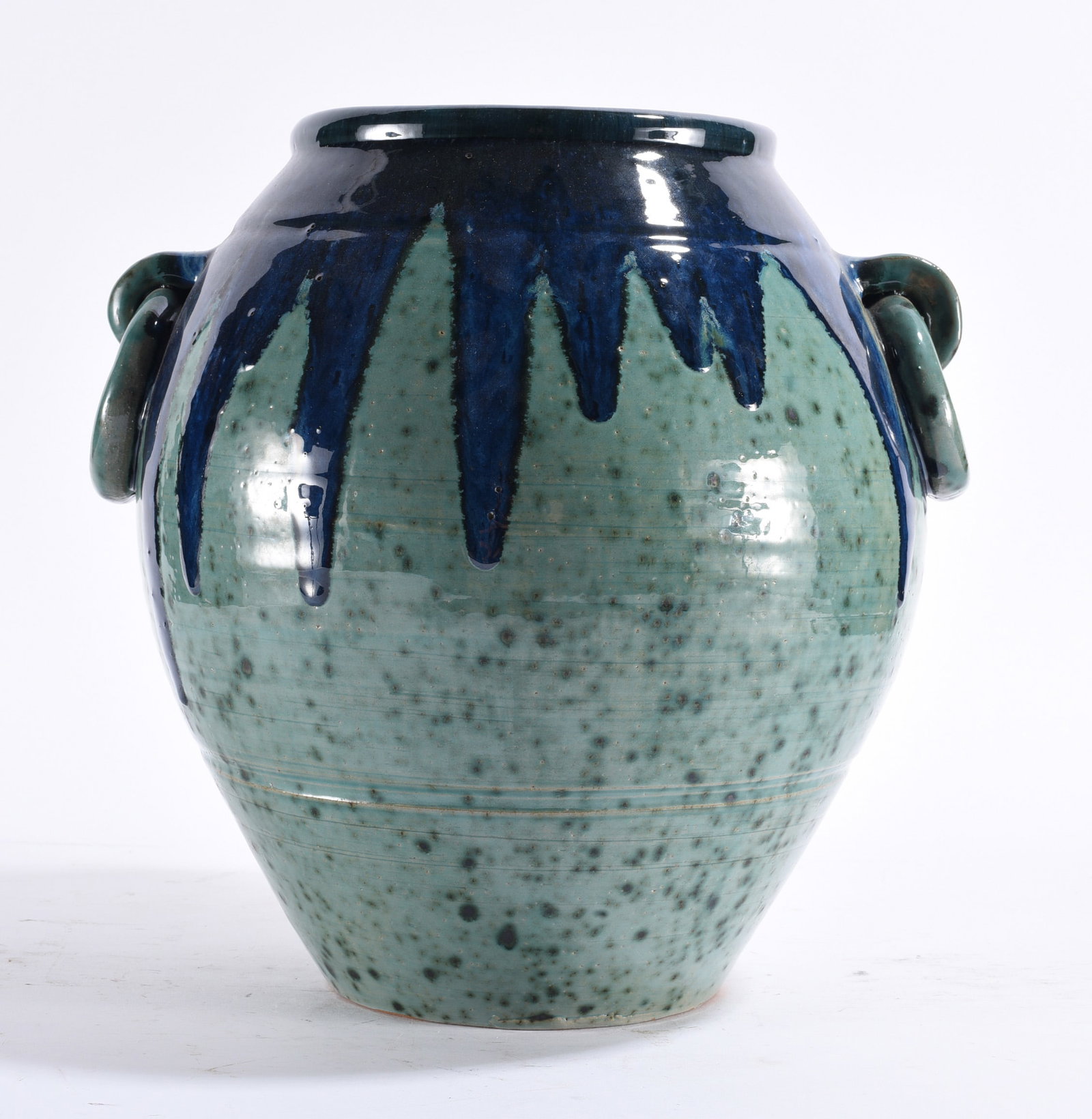 Randy Tobias Pottery Planter: Large wheel-thrown pottery planter Randy Tobias, having a rounded body with paired applied handles and a dramatic two-tone glaze. The vessel is covered in a speckled celadon/sea-green glaze with heavy