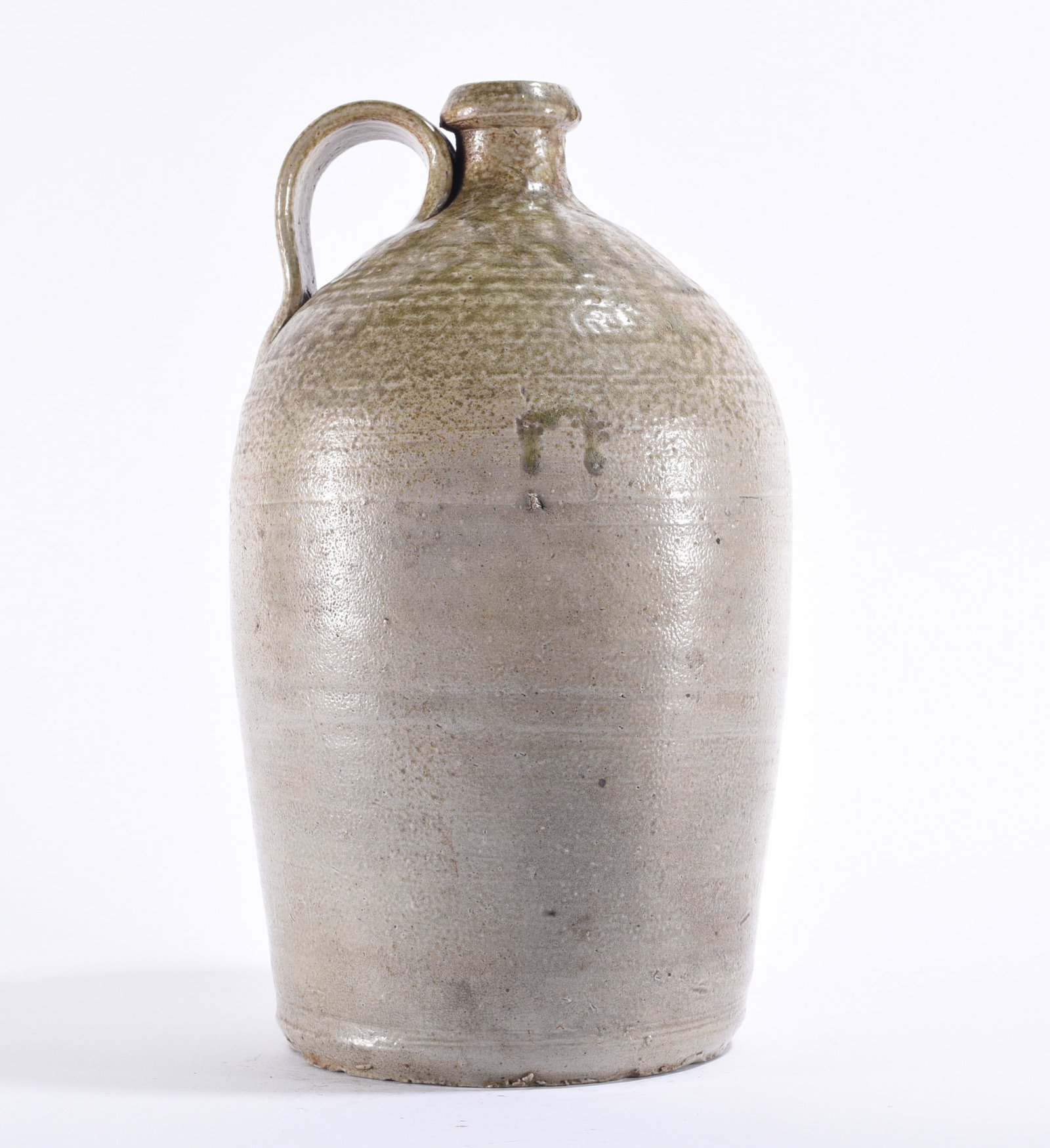 Wrenn Bros. Signed NC Pottery Jug ca. 1880: Wrenn Brothers, North Carolina, signed stoneware jar, circa 1880, of tapered cylindrical form with broad rolled rim and opposing lug handles. The vessel is covered in a rich, glossy dark brown glaze