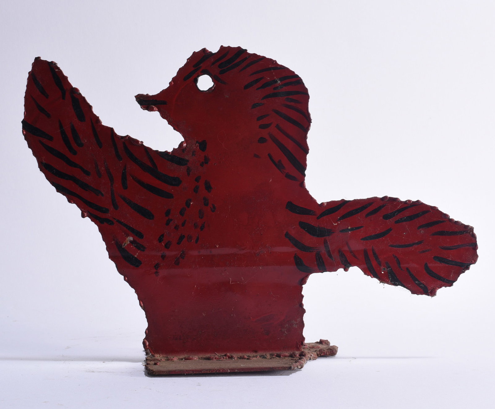 Willie Tarver (1932 - 2010) Sculpture: Willie L. Tarver (1932–2010), Wadley, Georgia, self-taught folk-art sculpture depicting a stylized bird in profile with dramatically raised wing and extended tail. Constructed from cut sheet metal, 