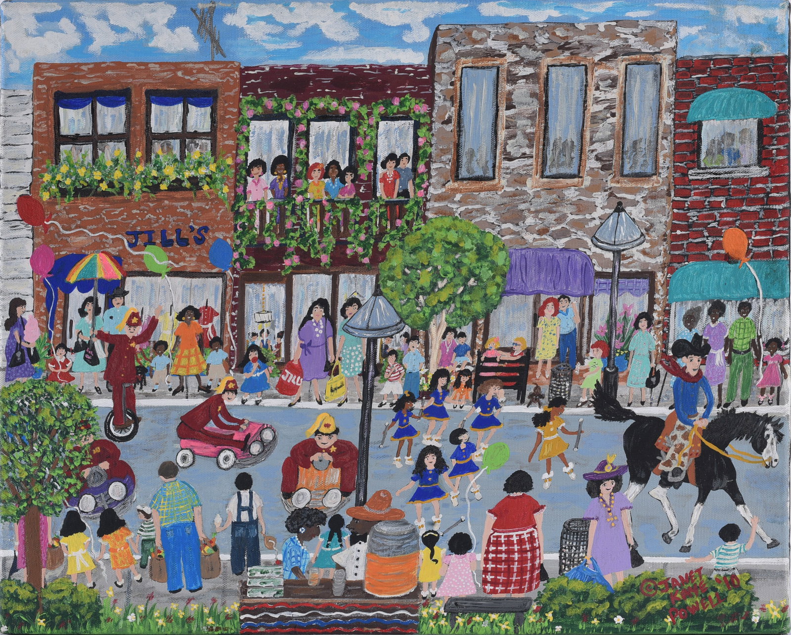 Janet K. Powell Folk Art Painting: Folk art painting by Janet K. Powell depicting a bustling small-town street celebration with crowds, storefronts, children, performers, horses and colorful architectural details. Signed “Janet K.