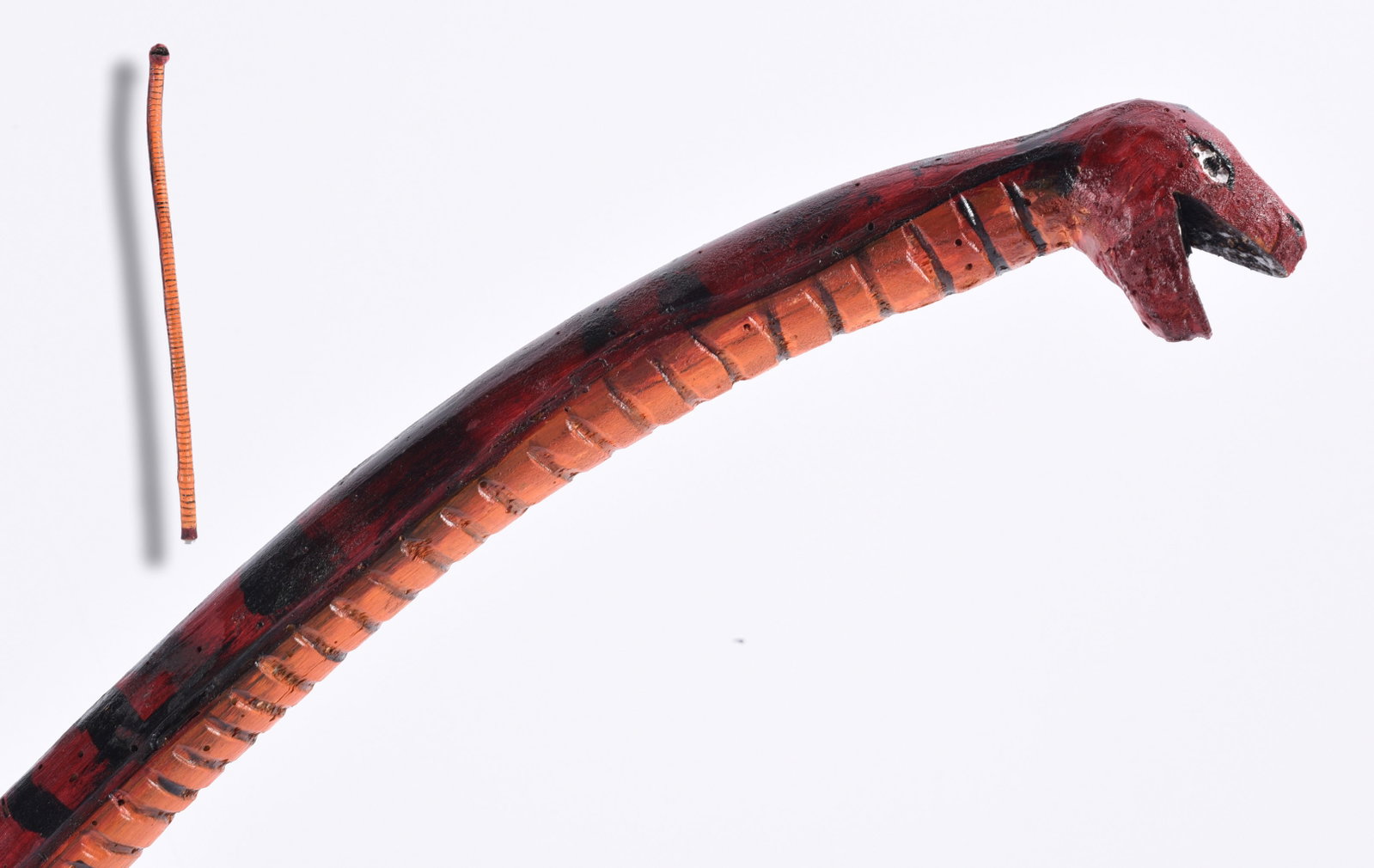 Richard Roebuck Folk Art Painted Cane Walking Stick: Hand-carved and painted folk art walking stick by Richard Roebuck, fashioned with a long curved figural handle resembling a stylized bird or animal head. Painted in deep red, black and orange with inc