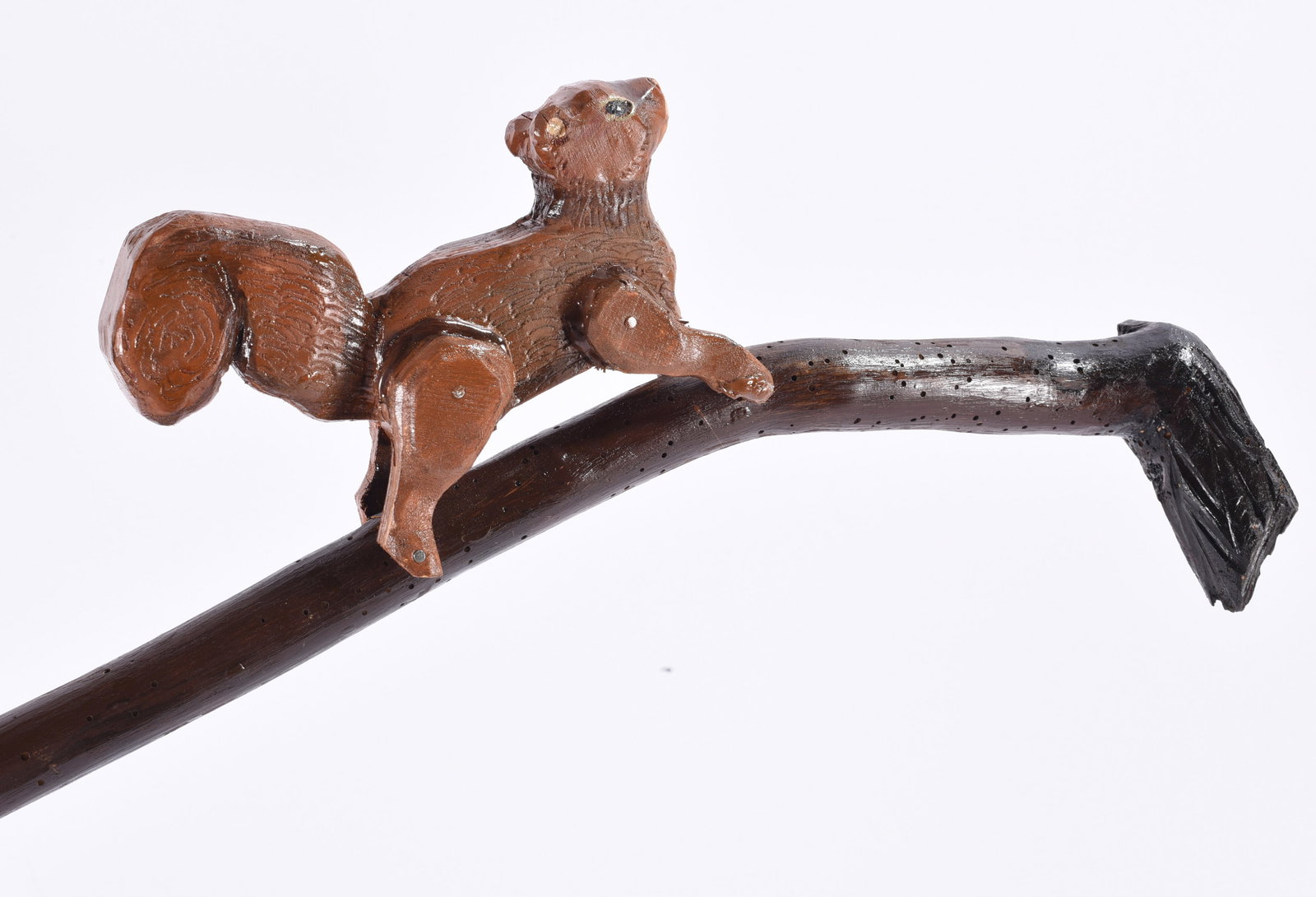 Richard Roebuck Folk Art Painted Cane Walking Stick: Hand-carved and painted folk art walking stick by Richard Roebuck, featuring a dimensional carved squirrel perched along the curved upper portion of the cane. The brown-painted squirrel has incised fu