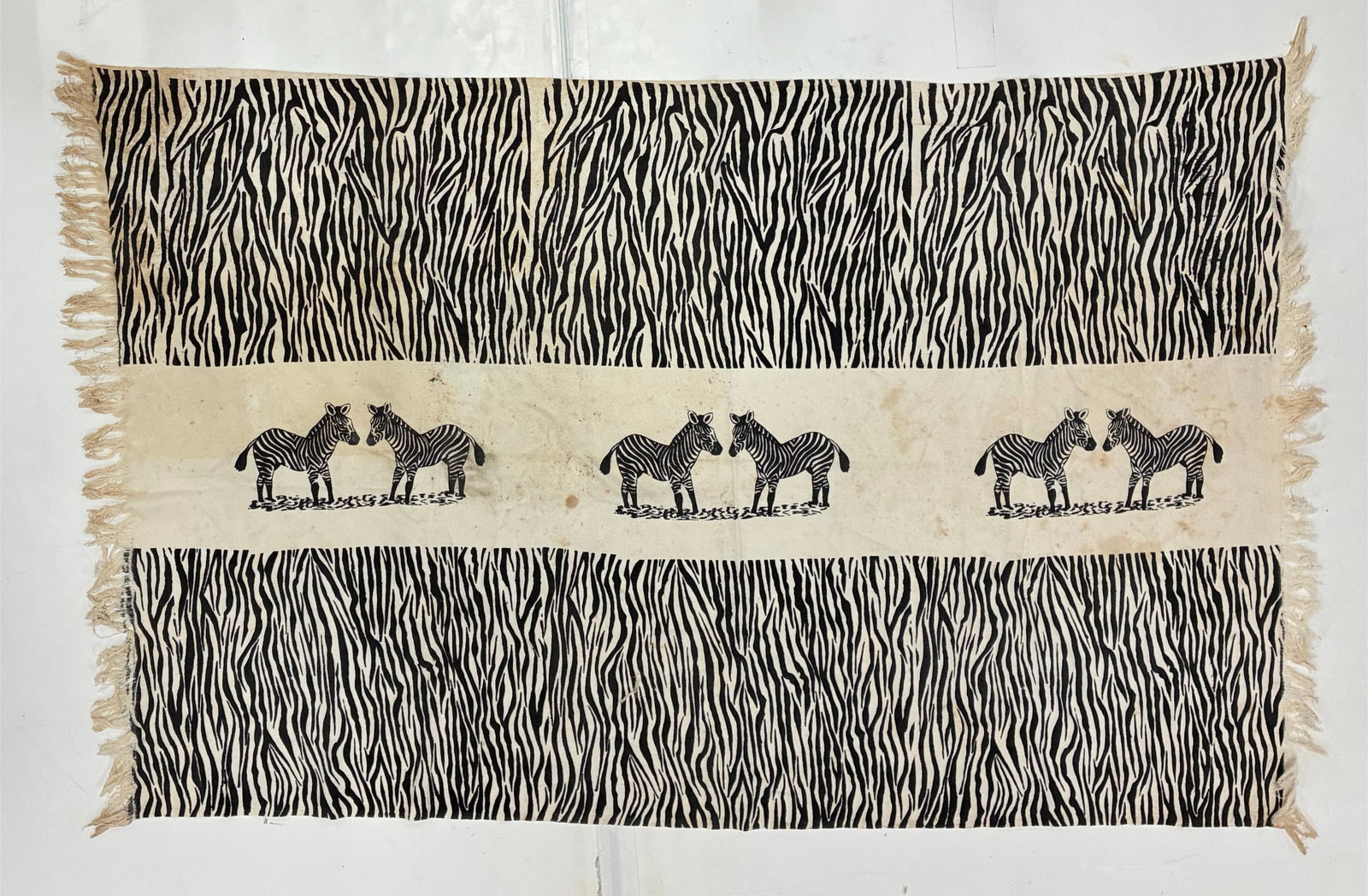 Small Vintage Zebra Motif Woven Textile with Fringe: 57"x37" Vintage woven textile or decorative throw featuring dramatic black-and-cream zebra-stripe patterning with a central horizontal band depicting three pairs of facing zebras. Fringe is present al