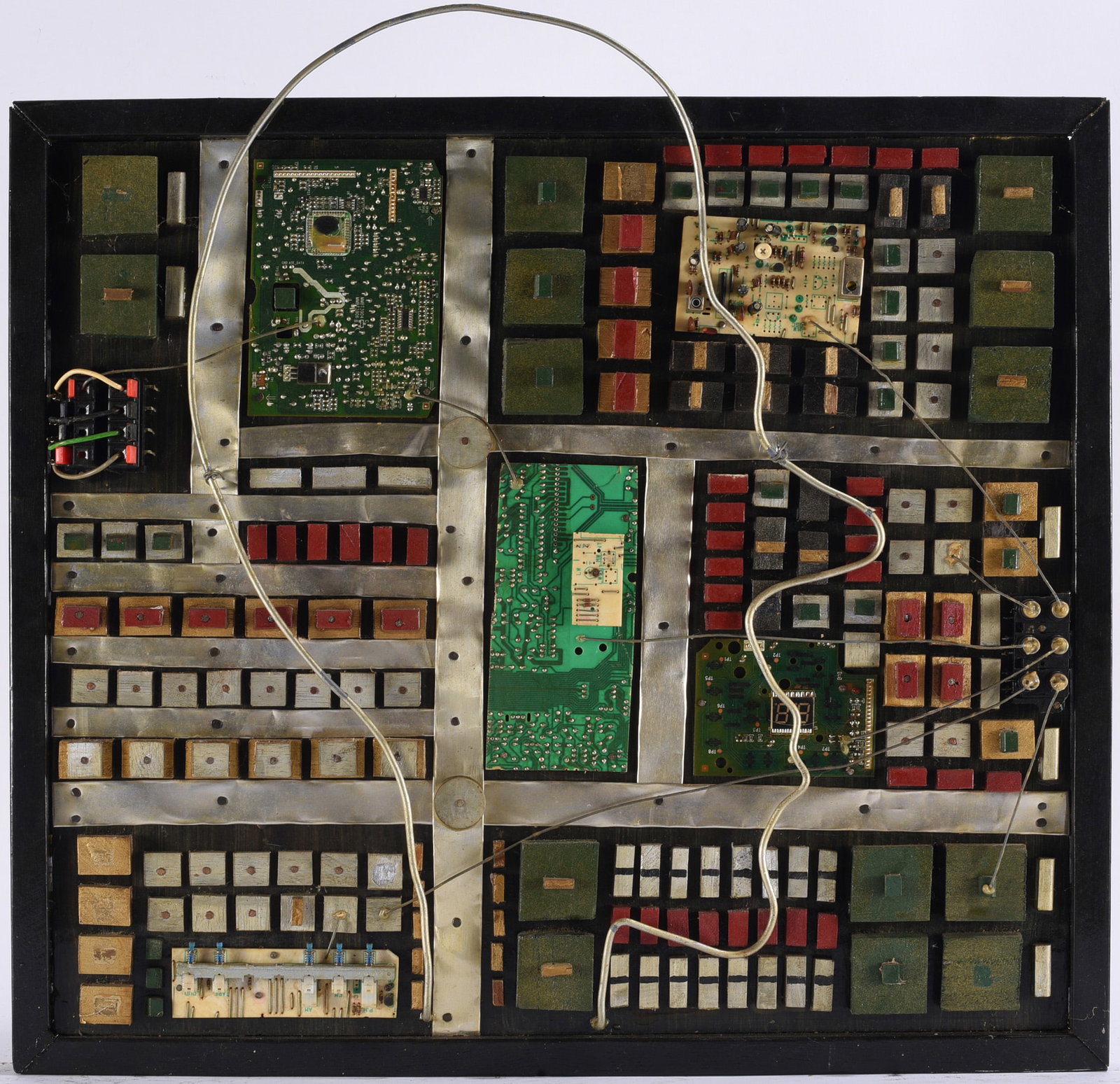 Dr. Richard Seed Folk Painting Collage: 22"x19" Dr. Richard Seed mixed-media folk art collage constructed from salvaged electronic components, circuit boards, metal strips, wire, switches, and small geometric blocks arranged into a dense ar