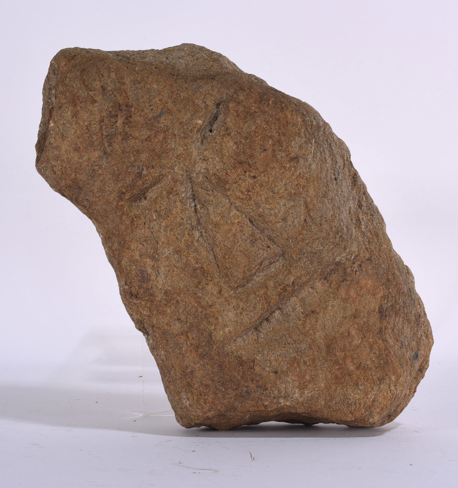 Primitive Carved Stone Folk Art Figure: 8"x13" Primitive carved stone sculpture featuring a simplified figural image worked directly into the natural stone surface. The shallow carving and weathered brown surface give the piece the appearan