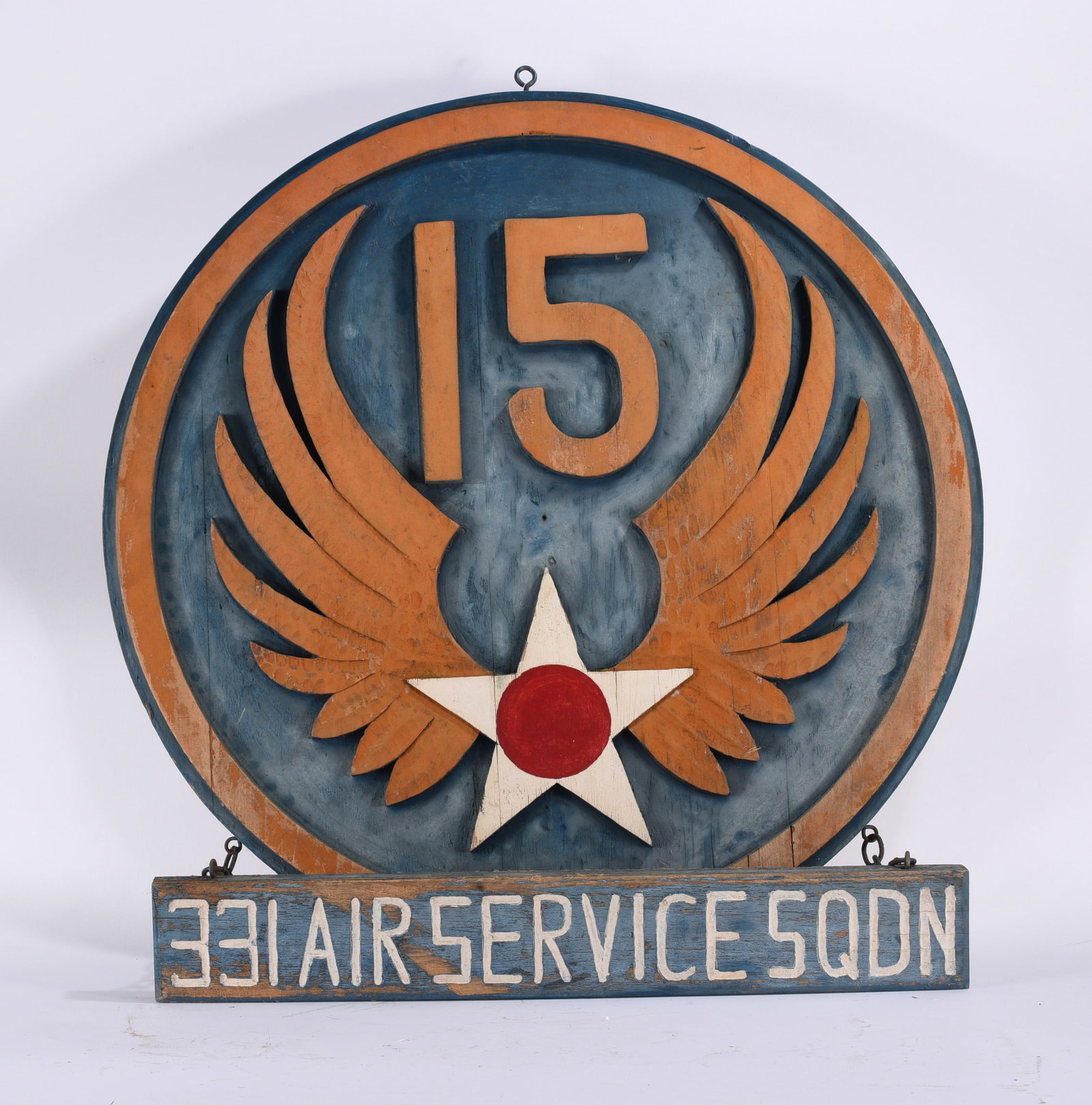 Folk Art 15th Air Service Squadron Military Sign: 31" diameter Handmade folk art military sign featuring a large circular painted panel with raised "15," wings and star insignia above a separately suspended panel reading "331 AIR SERVICE SQDN." Const