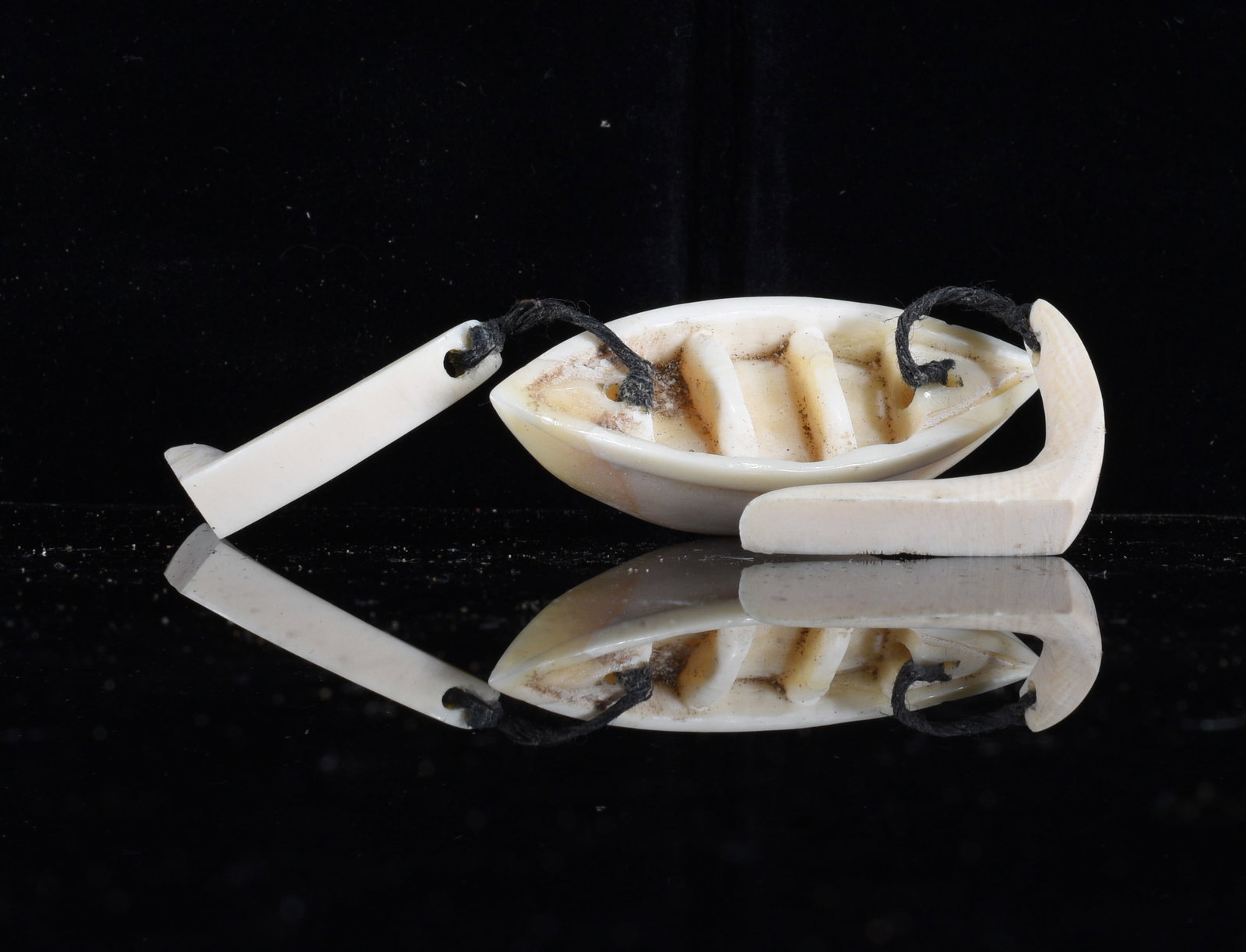 Inuit Carved Bone Kayak with Paddle (1 of 2)