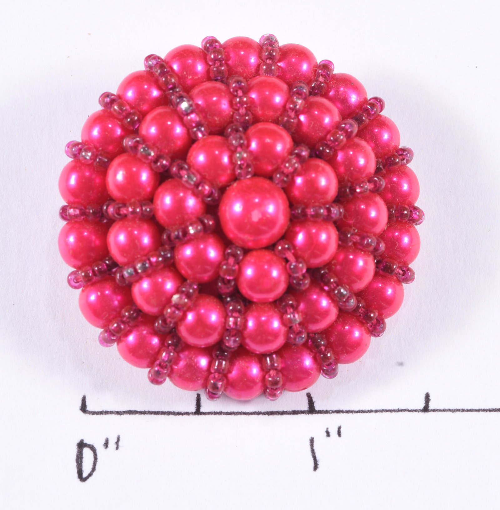 Vintage Pink Beaded Dome Button: Vintage domed pink beaded button composed of numerous lustrous faux-pearl beads arranged concentrically and separated by rows of small translucent seed beads. Pink fabric-covered back with metal loop 