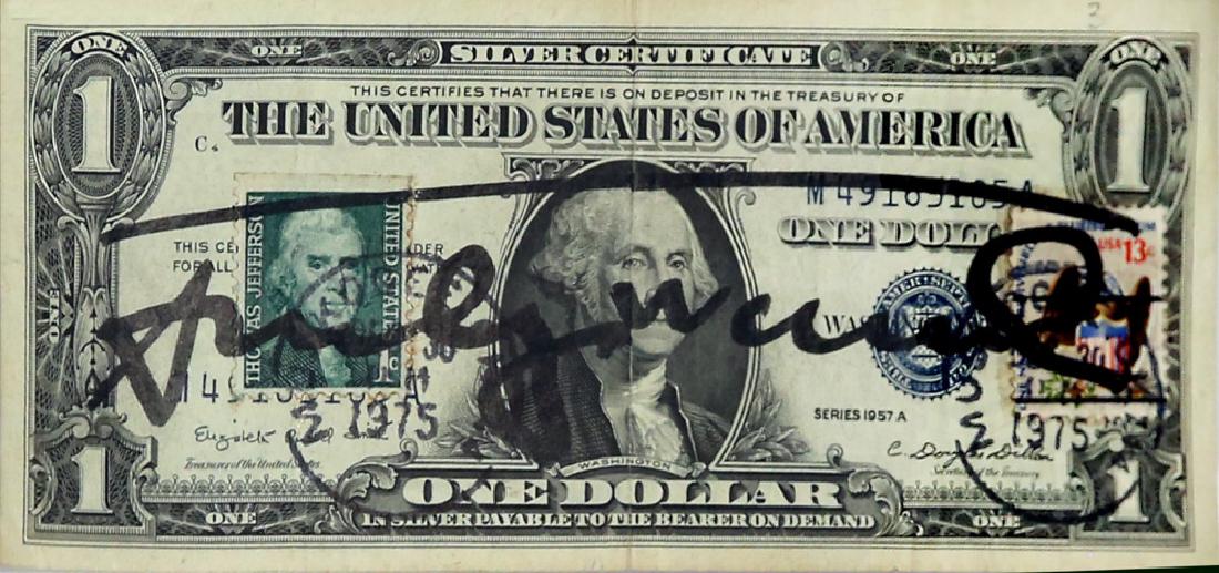 ANDY WARHOL AMERICAN 1928-1987: One Dollar, US-American one dollar bill with two canceled stamps, Signed in felt pen on front and stamped 'Andy Warhol' on verso. dated 1975