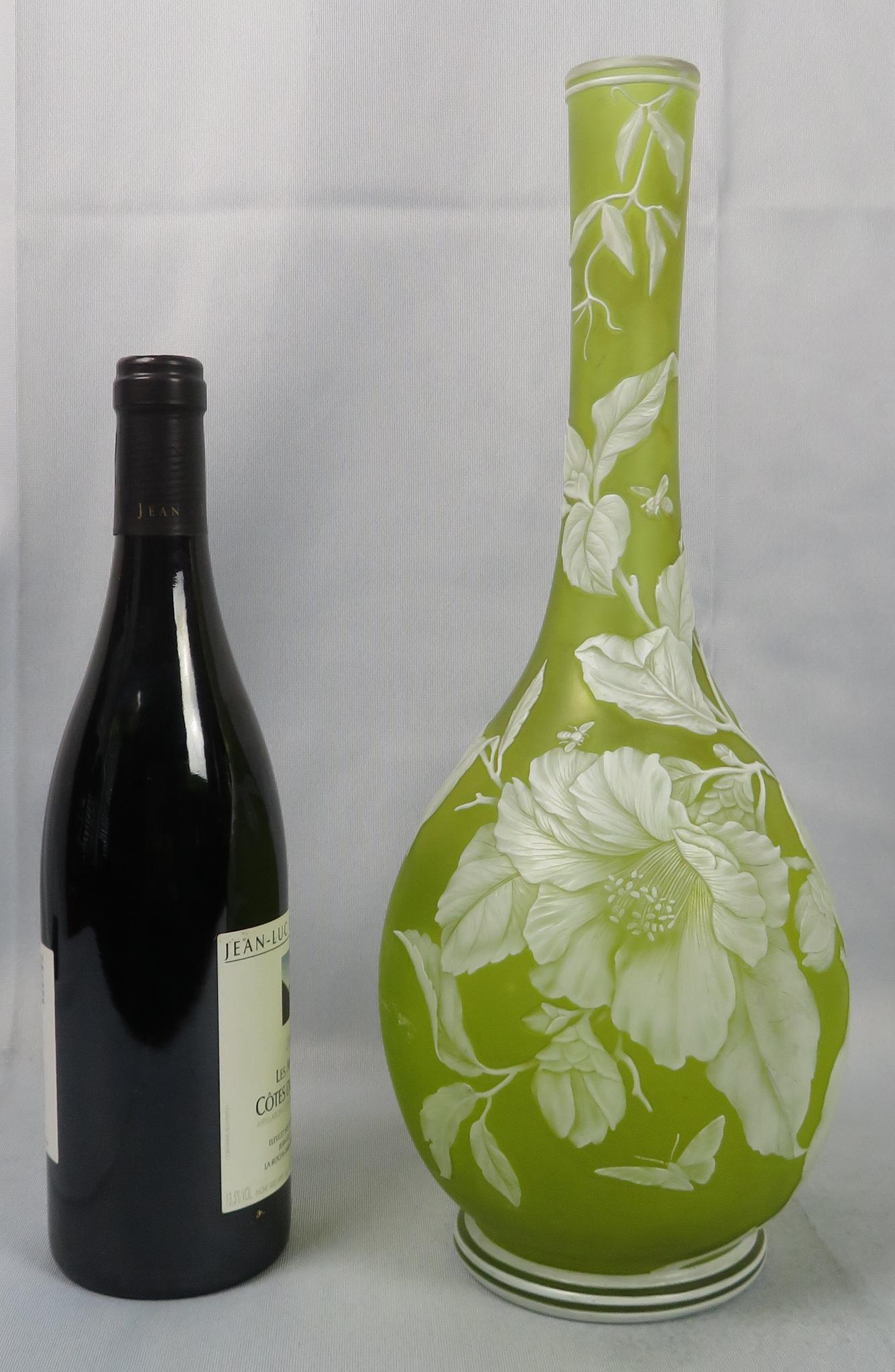 Monumental Thomas Webb English Cameo Cut Glass Vase: Maker: Thomas Webb (attrib.) Location of Manufacture: Stourbridge, England Period: Last Quarter of 19th Century Materials: Carved Glass Dimensions: 15"(h) ; 6" maximum diameter Weight: 3 lbs. 11 oz. F