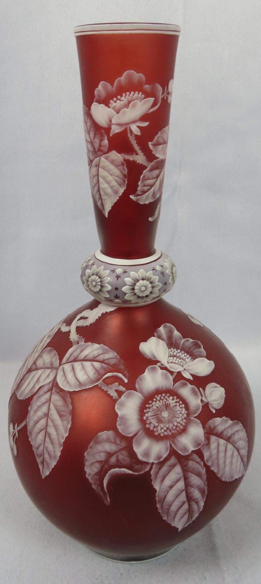 Large Thomas Webb Wild Rose Cameo Cut Glass Vase: Maker: Thomas Webb (attrib.) Location of Manufacture: Stourbridge, England Period of Manufacture: Last Quarter of 19th Century Materials: Carved Glass Dimensions: 12 1/4"(h) ; 5 1/2" maximum diameter 